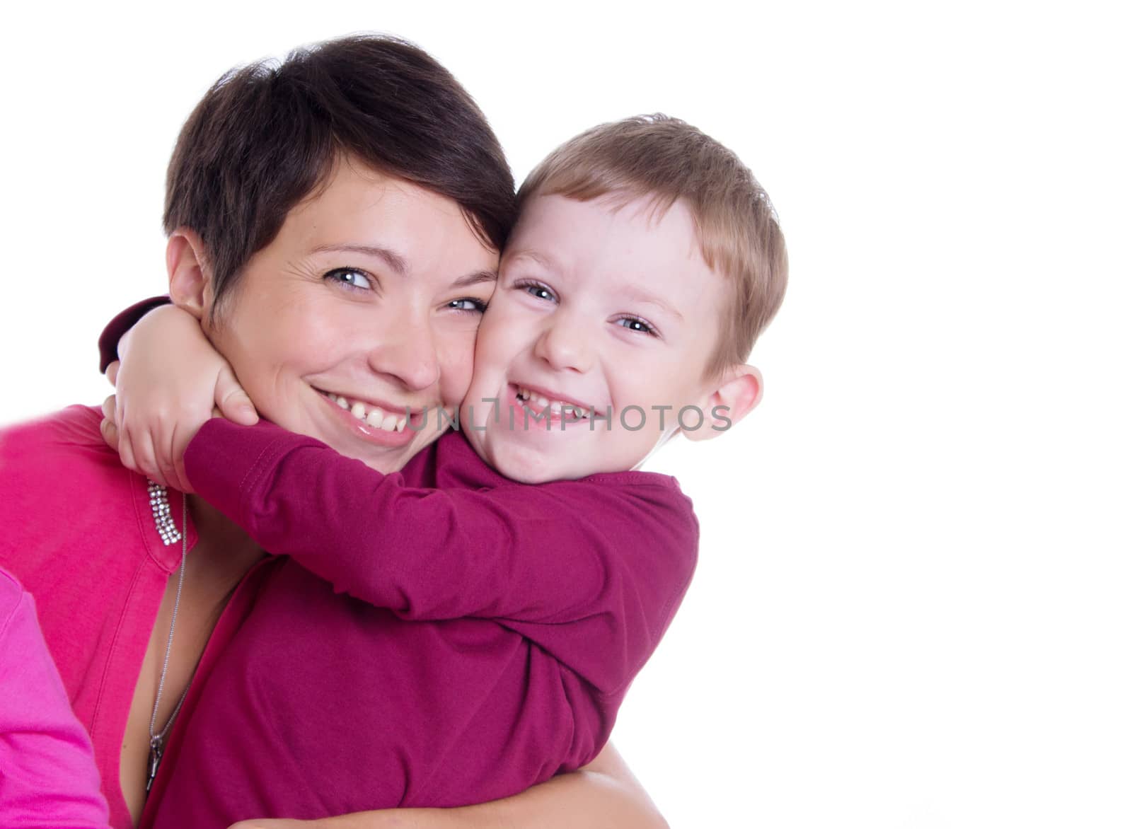 Happy mother and son hugging over white