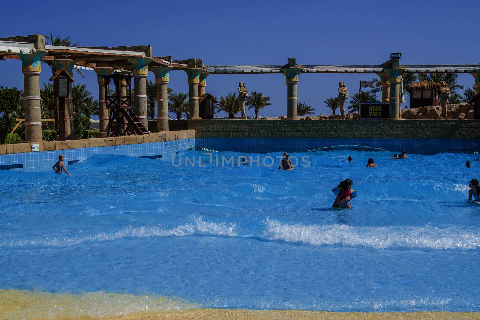 The children thrive with swimming in a wave pool at Cleo water park located at the hotel Hilton Sharm Dreams Naama Bay, Egypt.