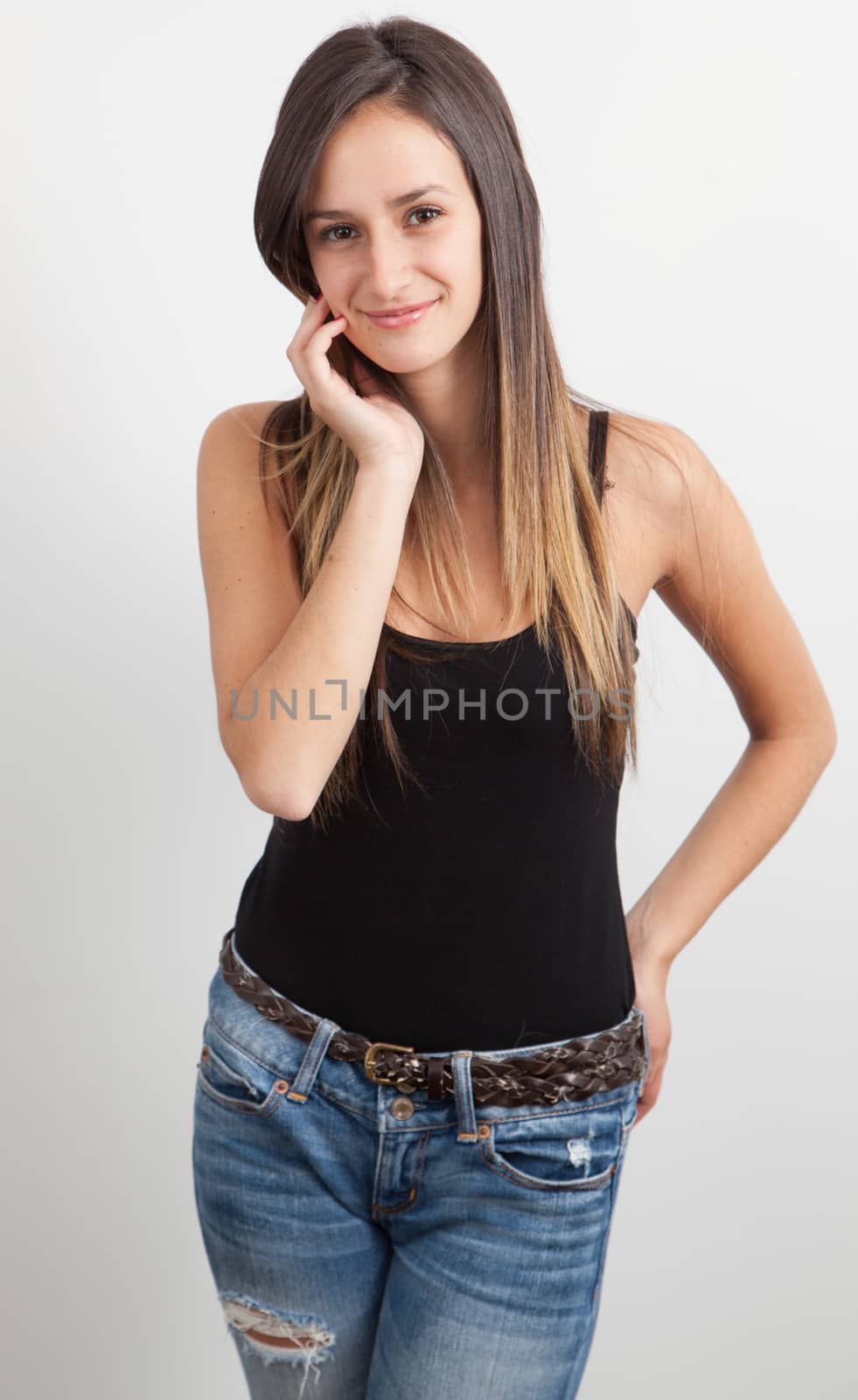 Young woman smiling by Izaphoto