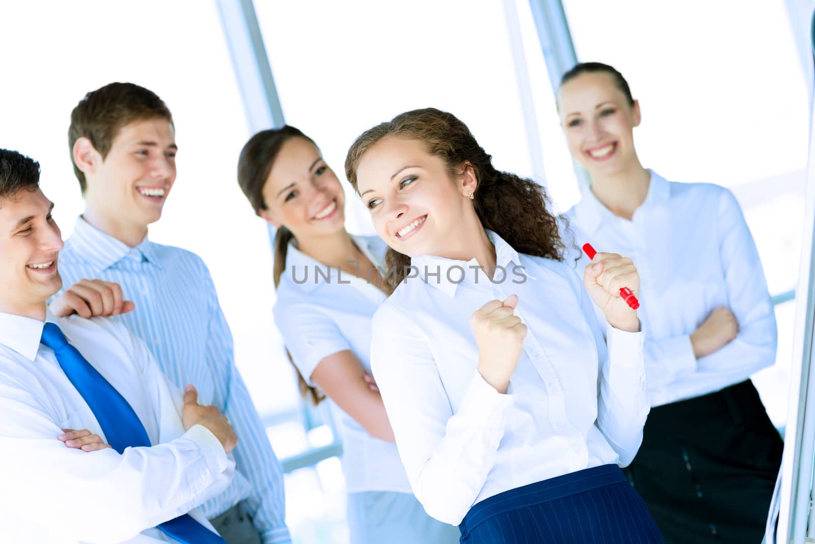 happy business woman standing next to their counterparts outside the flipchart achievements in business