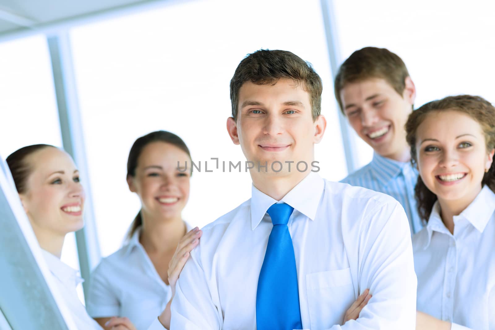 businessman receiving congratulations from his colleagues, business achievements