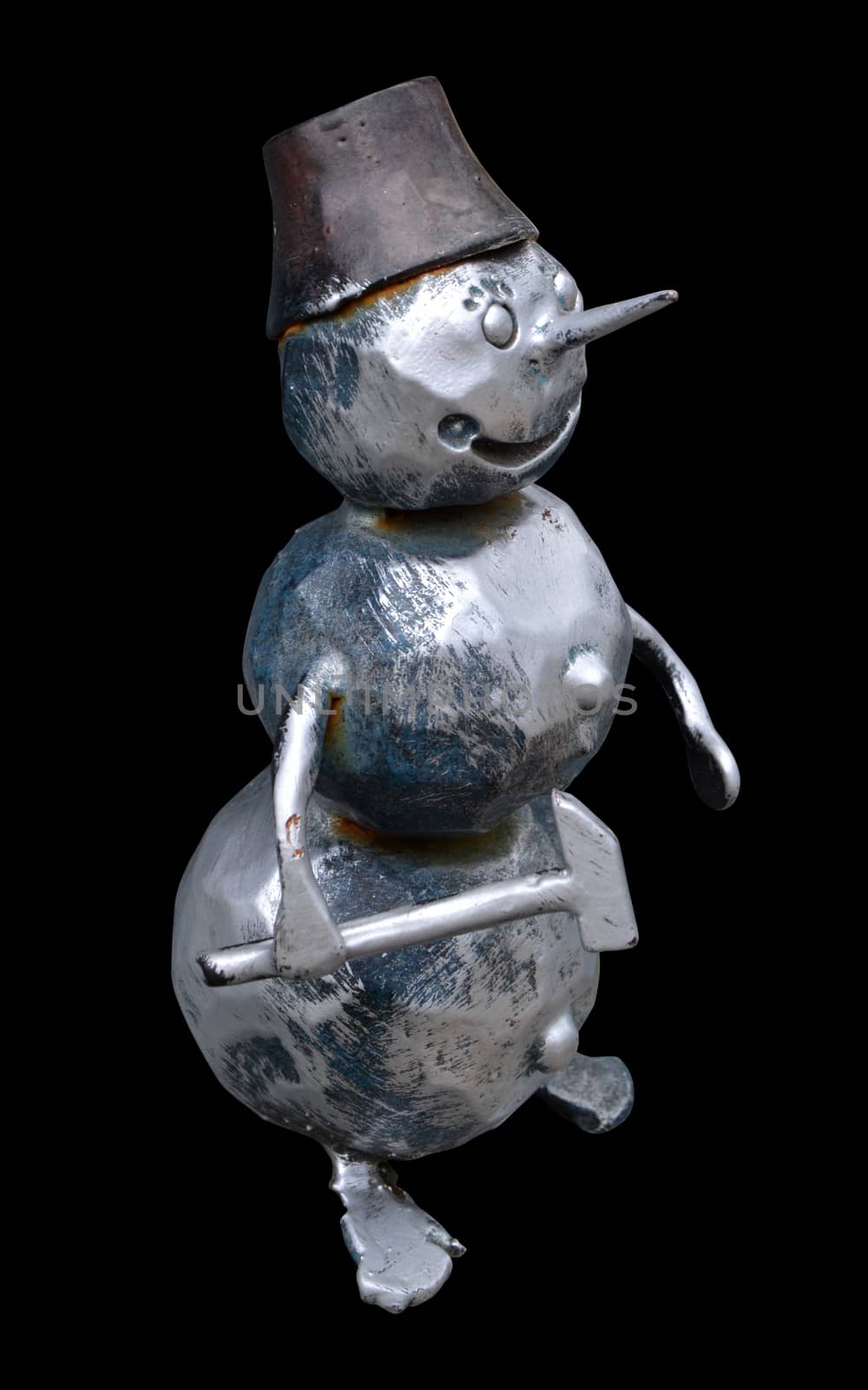 Isolated forged metal snowman with a hammer on a black backgroun by pt-home