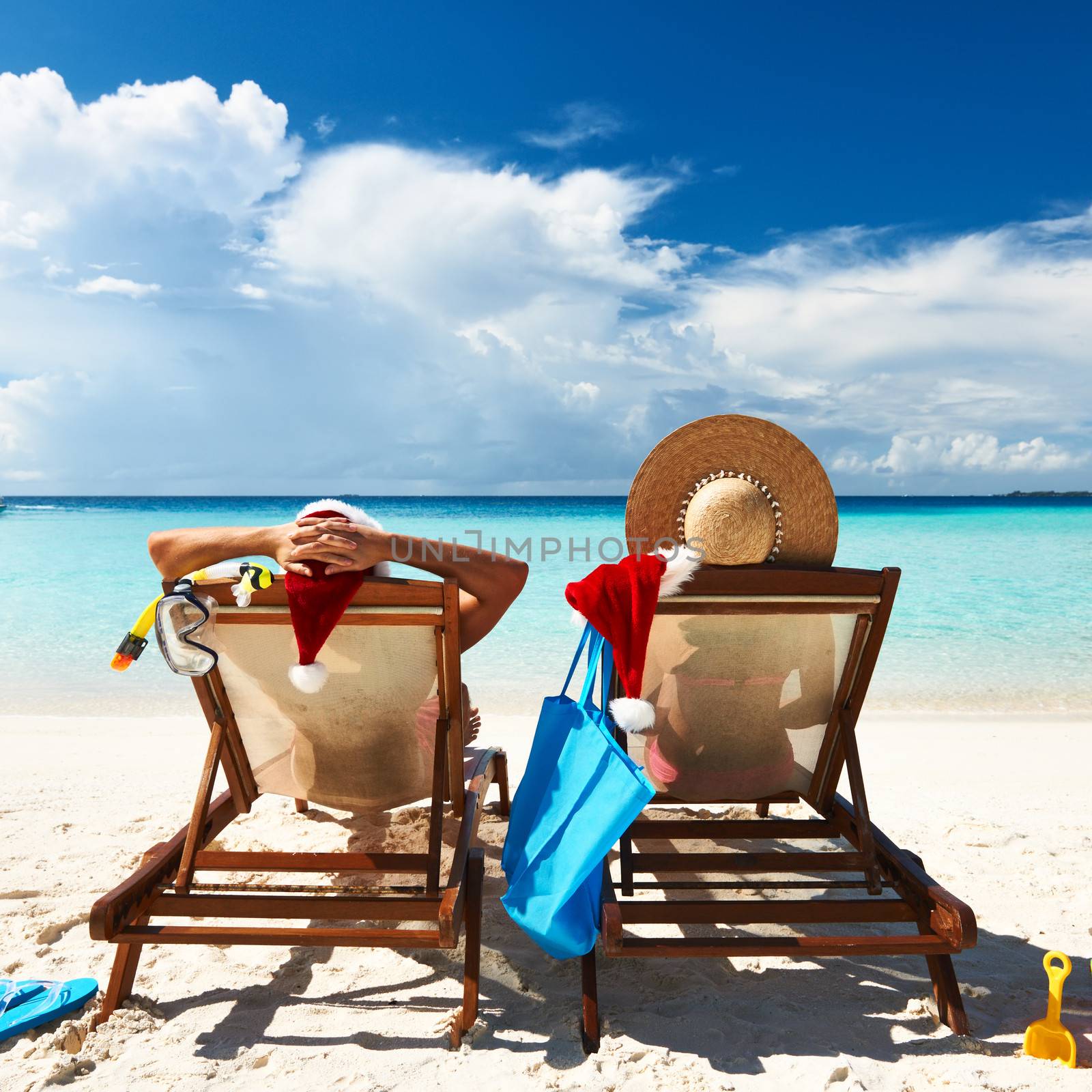 Couple on a tropical beach at Maldives