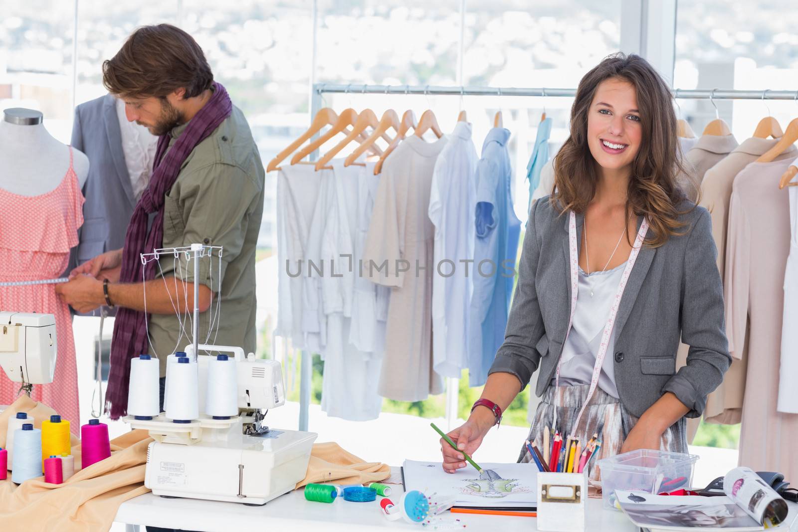 Young fashion designers working in a bright office