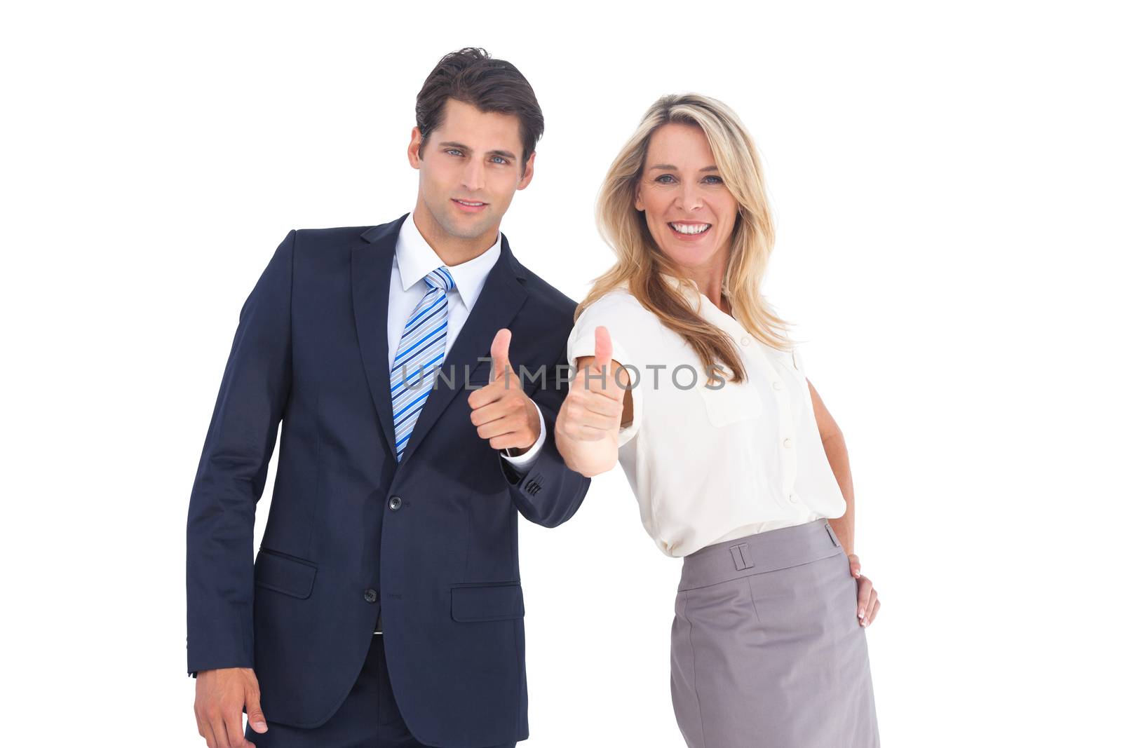 Business people smiling with thumbs up