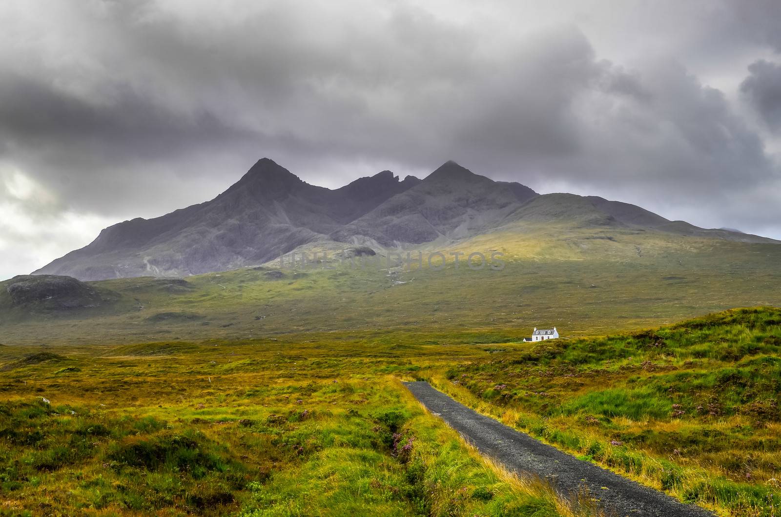 Cuillin Hills mountains with lonely house and road, Scotland, United  Kingdom