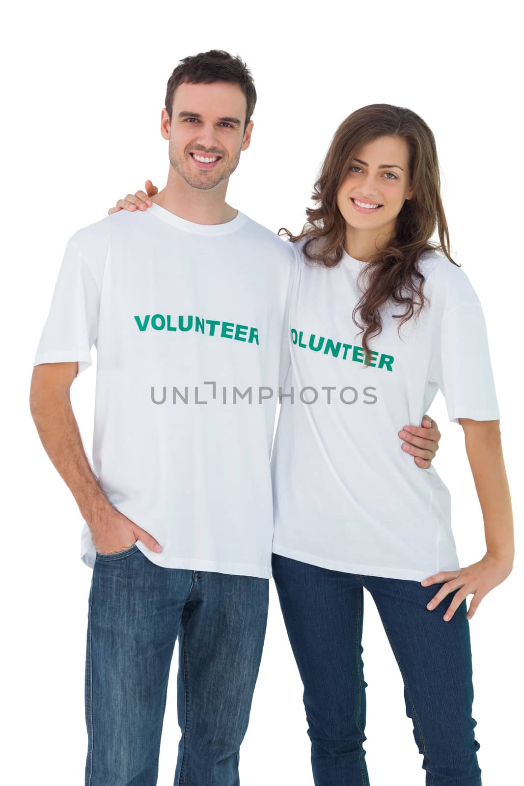 Two cheerful people wearing volunteer tshirt by Wavebreakmedia