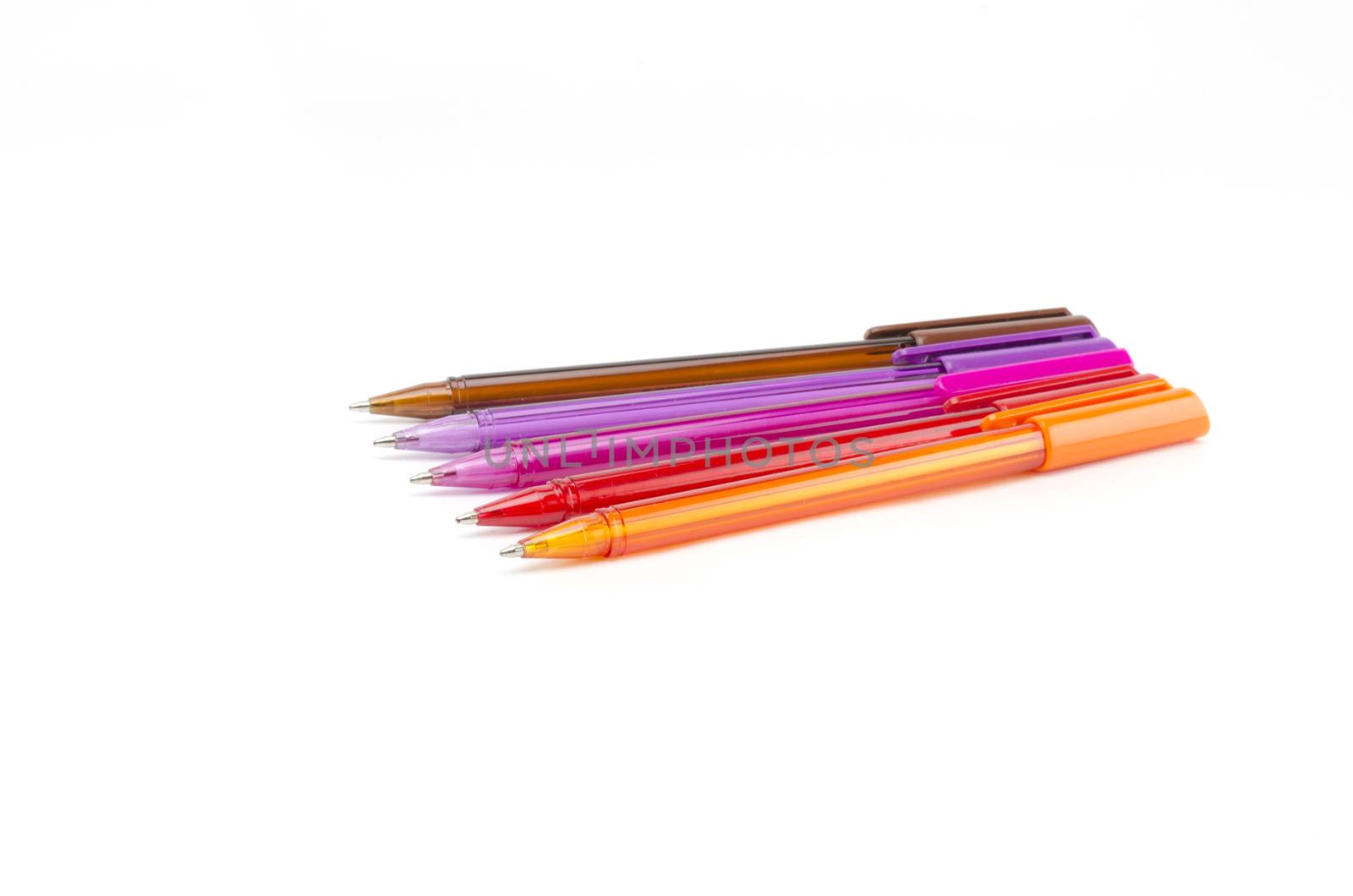 colorful pens isolated on white by ammza12