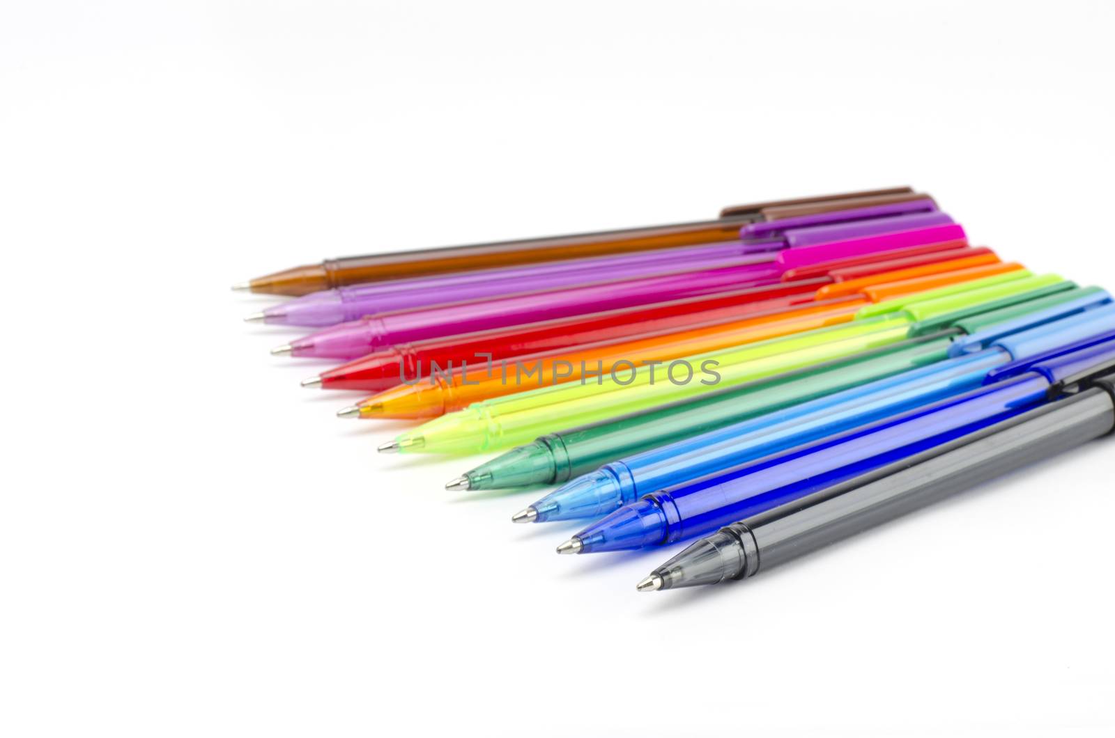 colorful pens isolated on white by ammza12