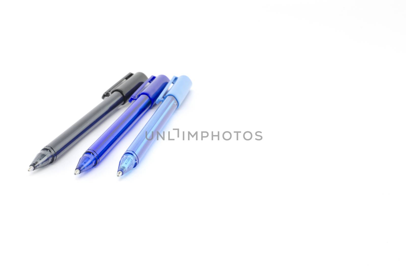 colorful pens isolated on white by ammza12