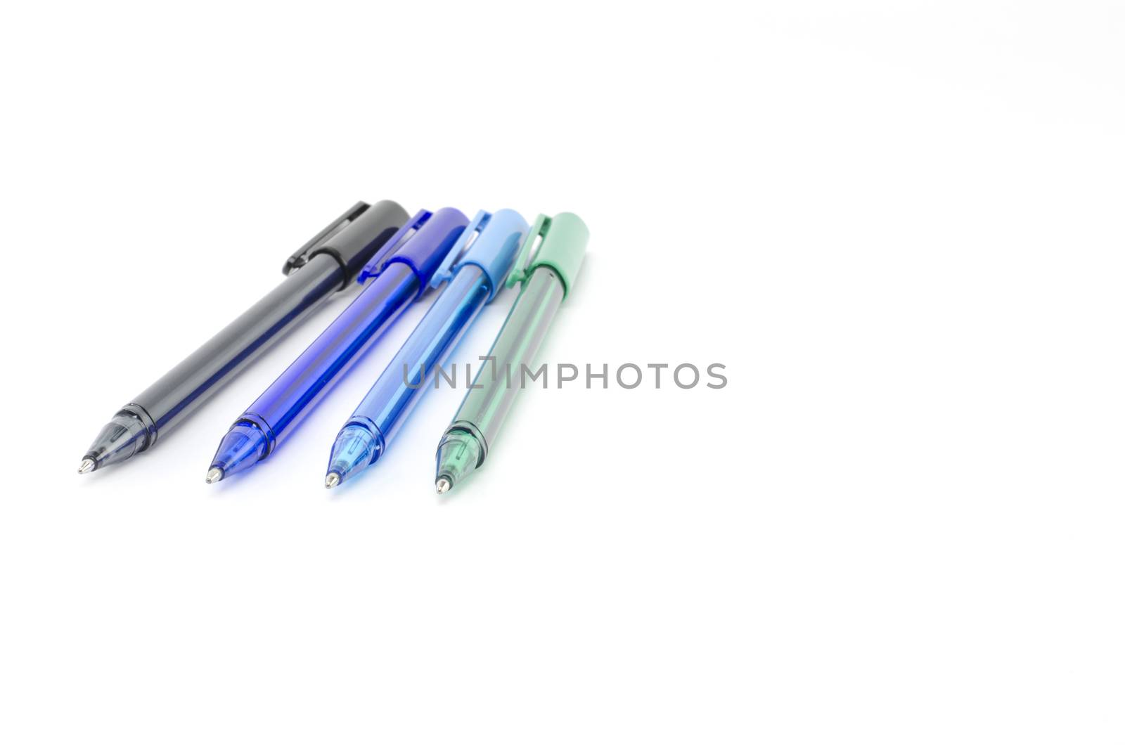 colorful pens isolated on white by ammza12