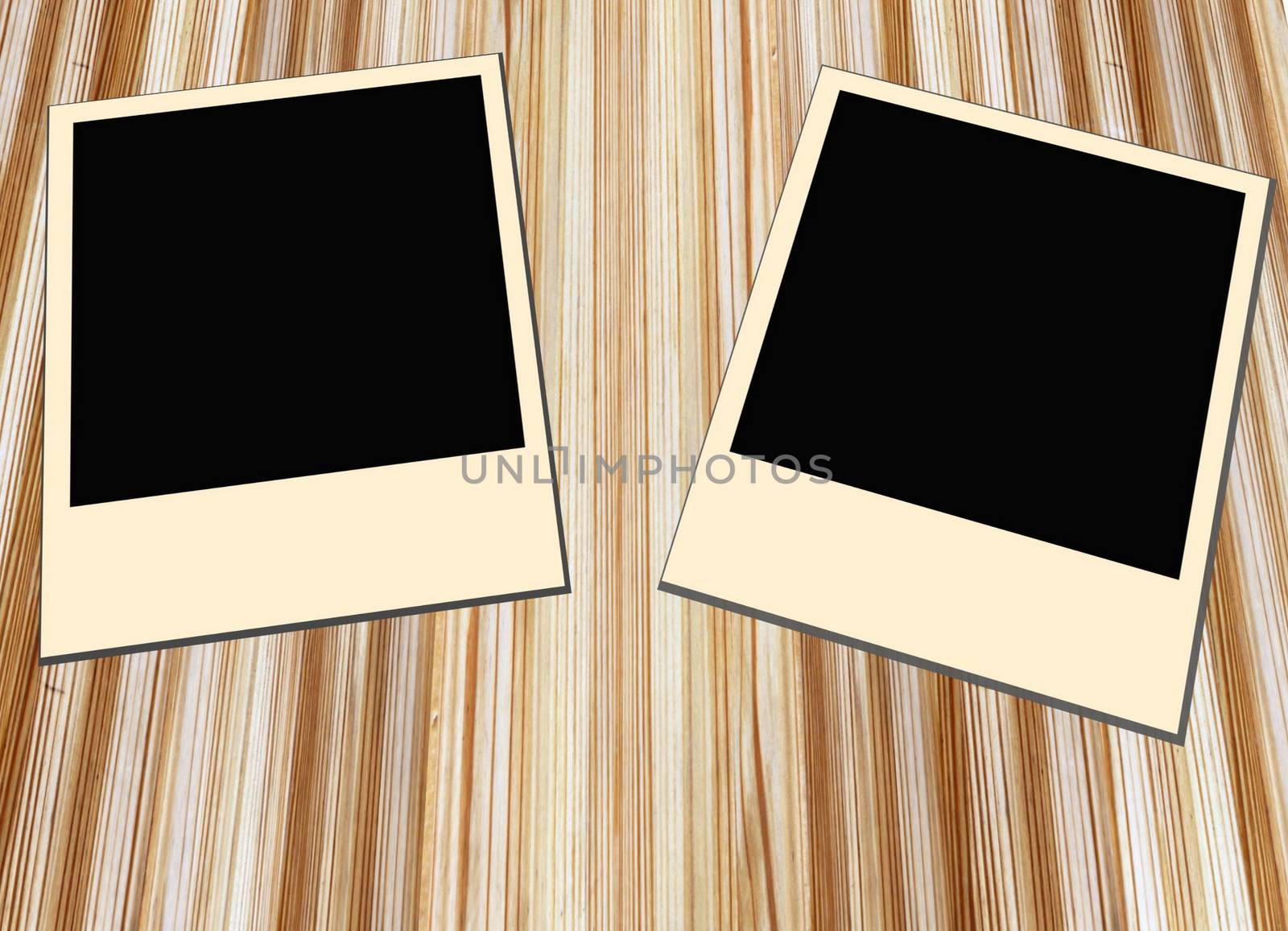 Blank old picture frames  on wooden background