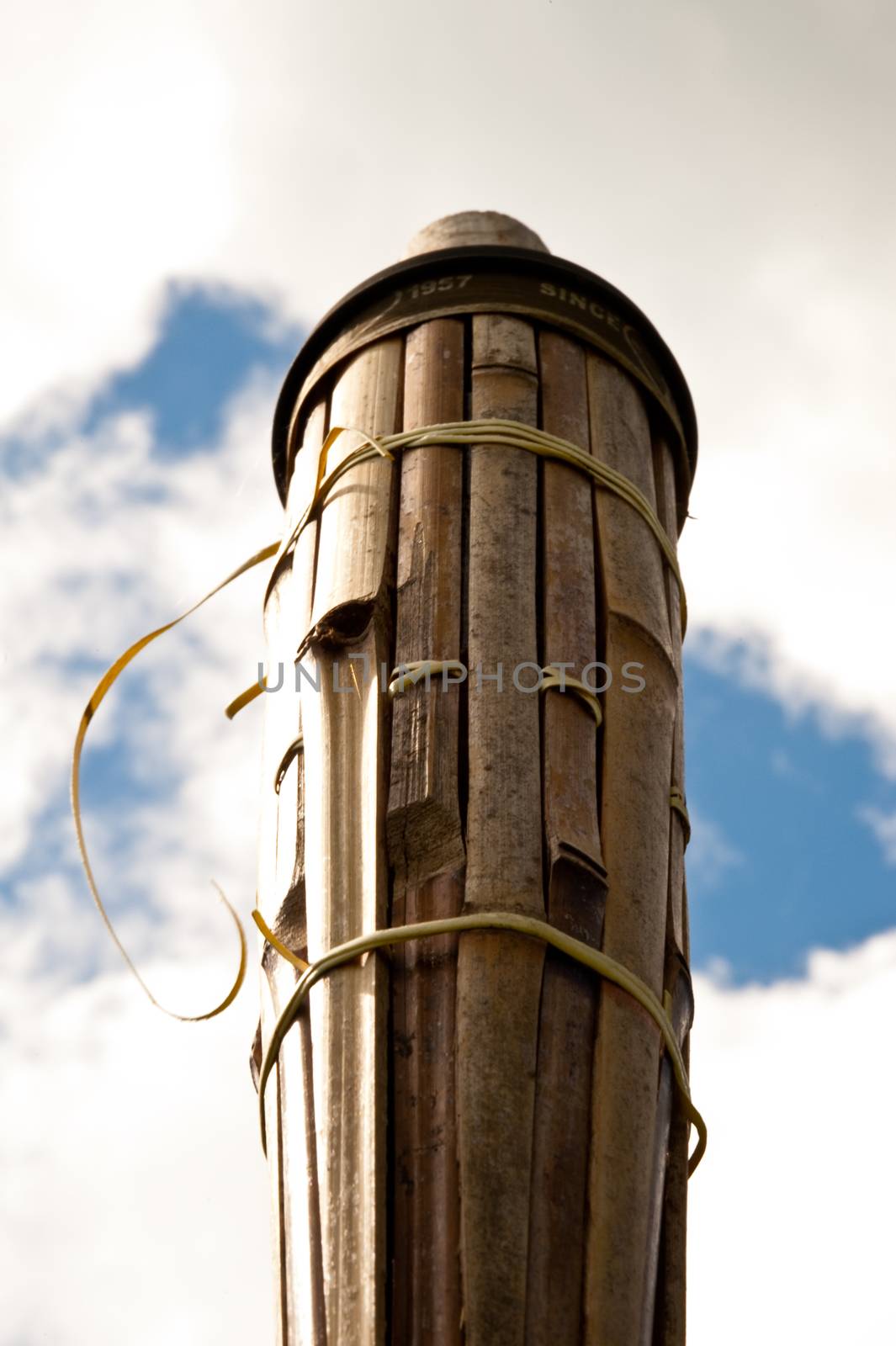 Top of an unlit tiki torch