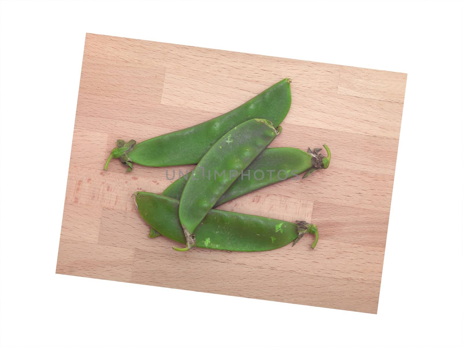 Split peas isolated on a wooden chopping board