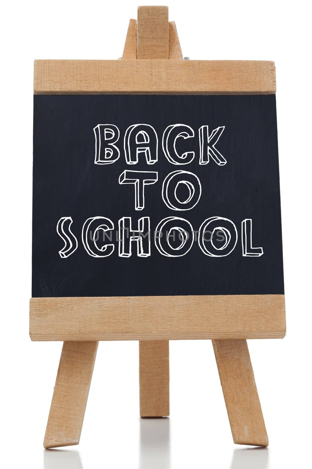 Back to school written on chalkboard by Wavebreakmedia