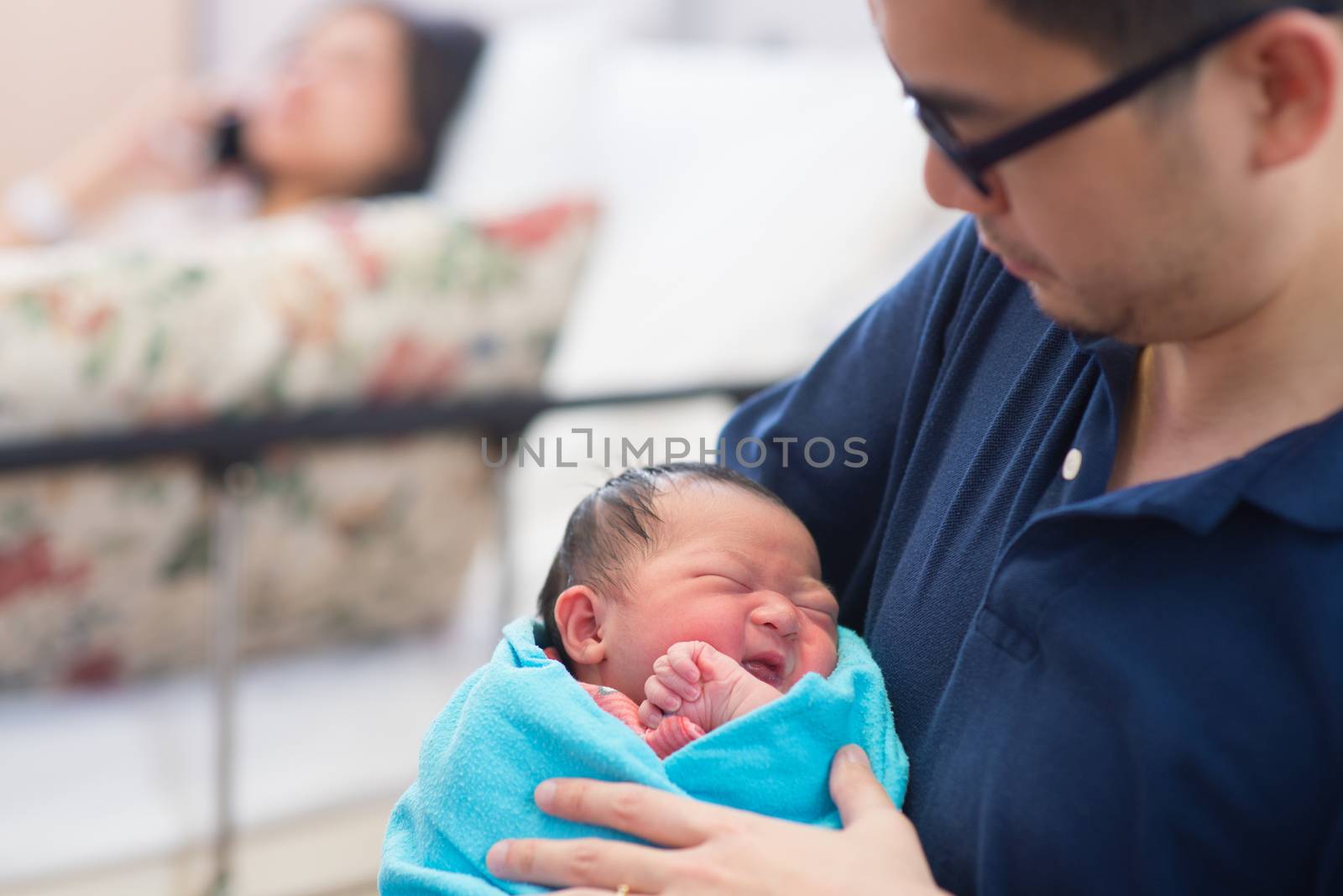 Newborn Asian baby girl and parents by szefei
