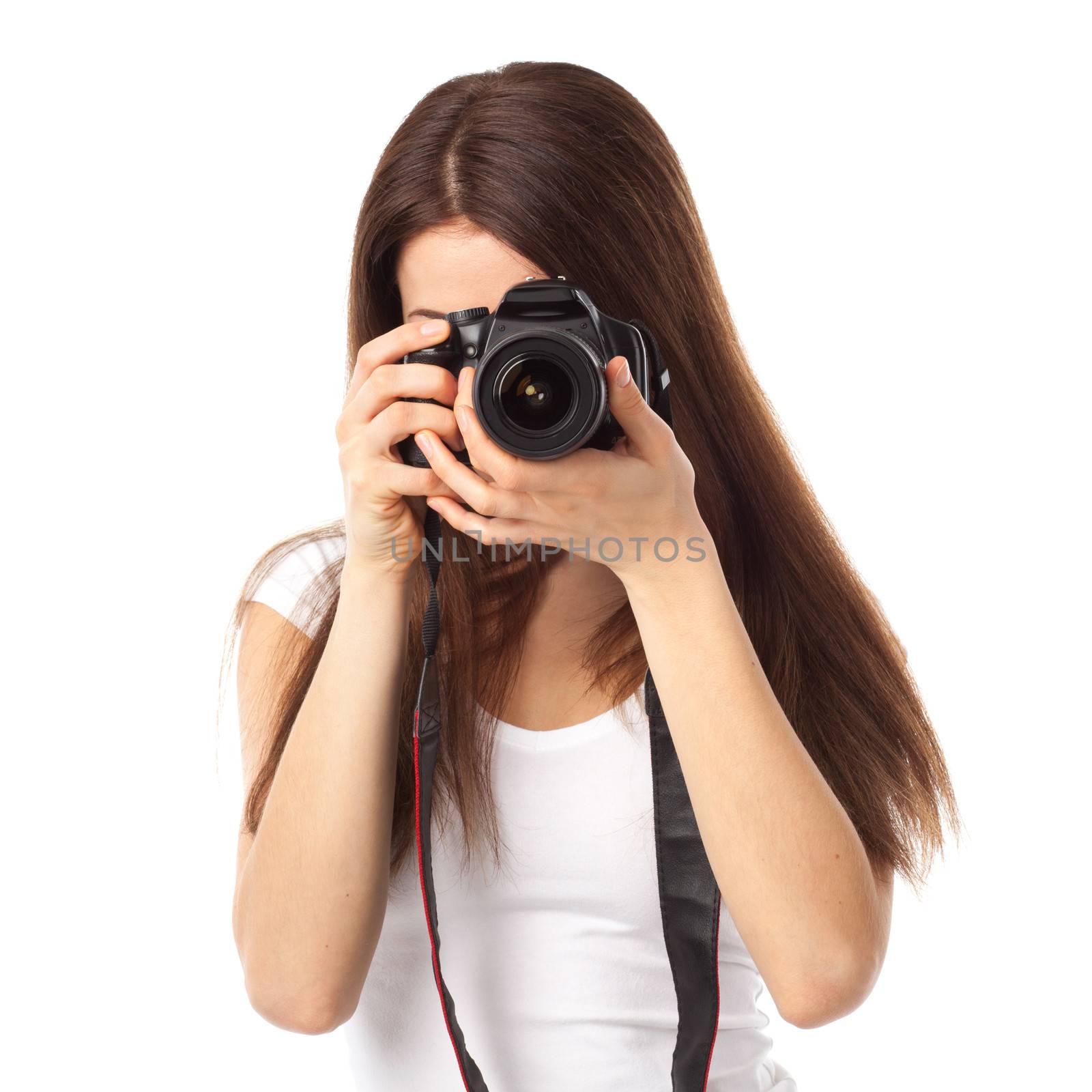 Young brunette with digital camera, isolated on white