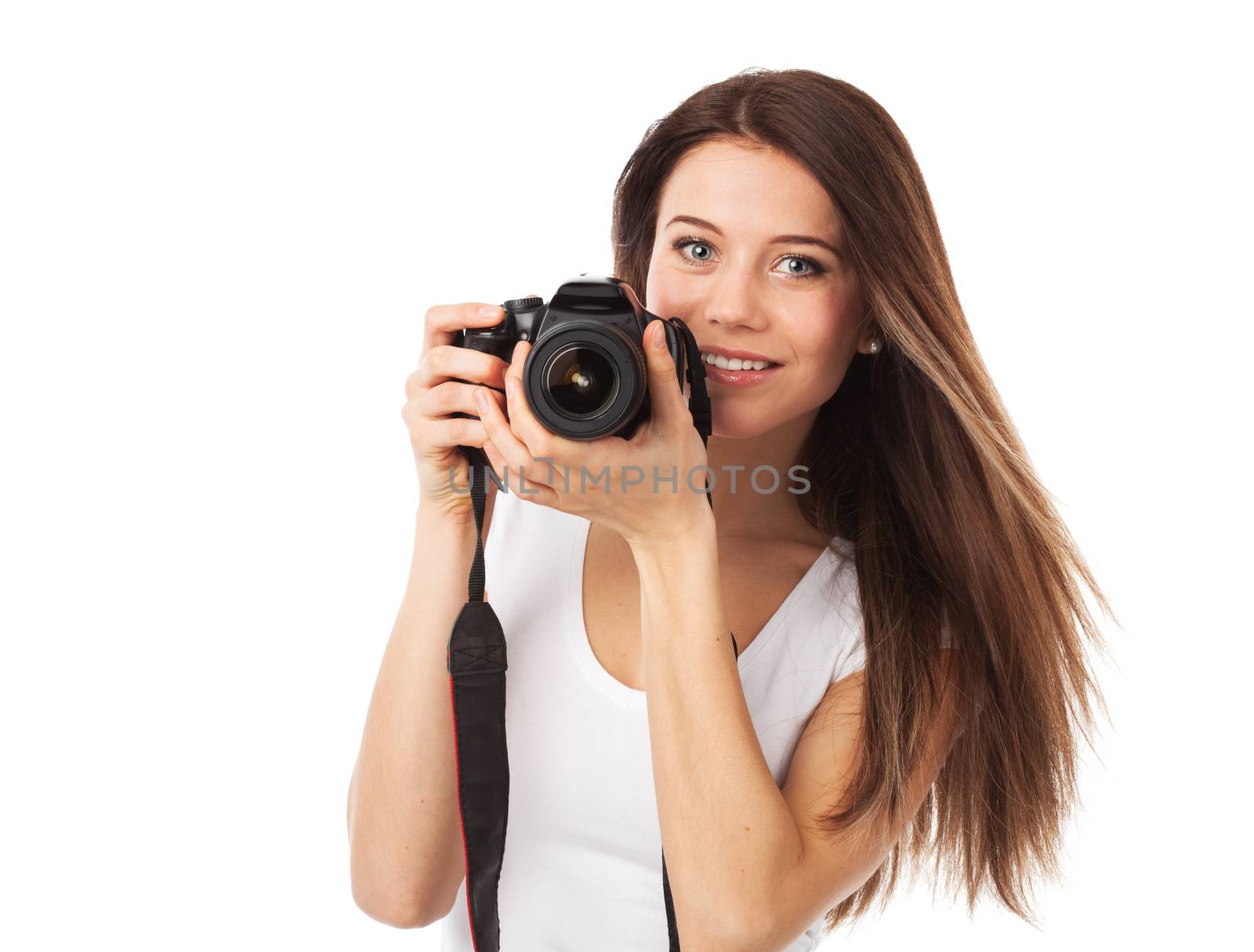 A cheerful young woman with digital camera, isolated on white