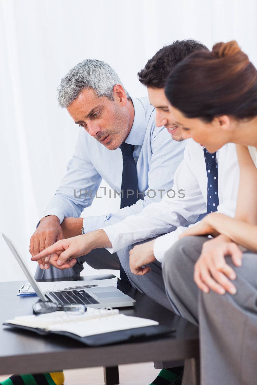 Business people working with their laptop on sofa by Wavebreakmedia