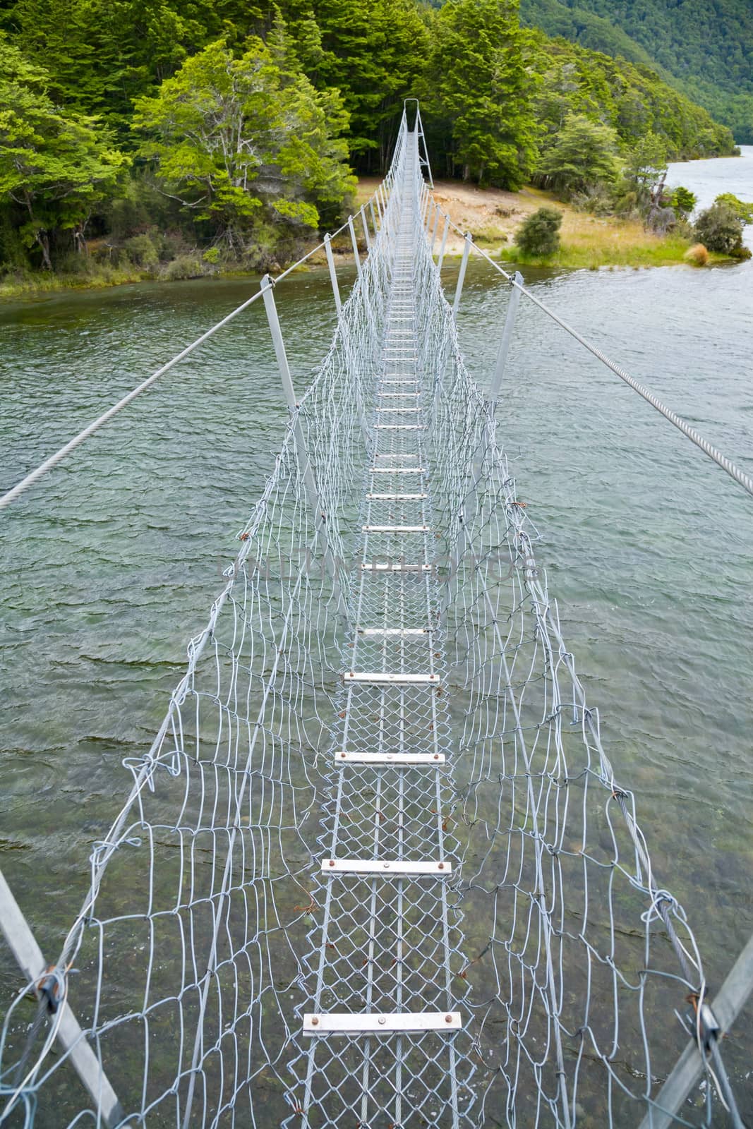 Swing bridge at North Mavora Lake in New Zealand