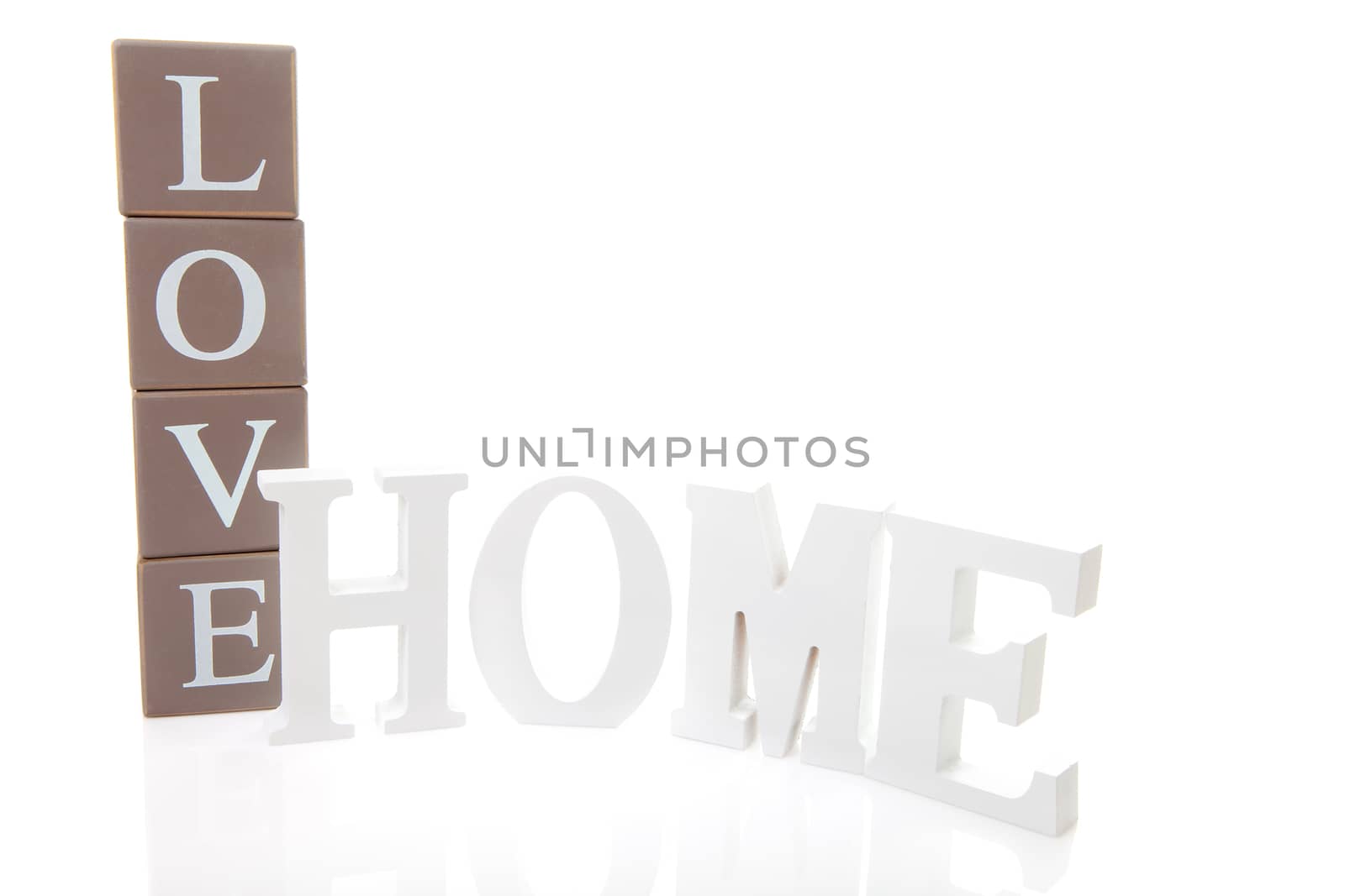 Word Love on blocks and Home in white letters isolated