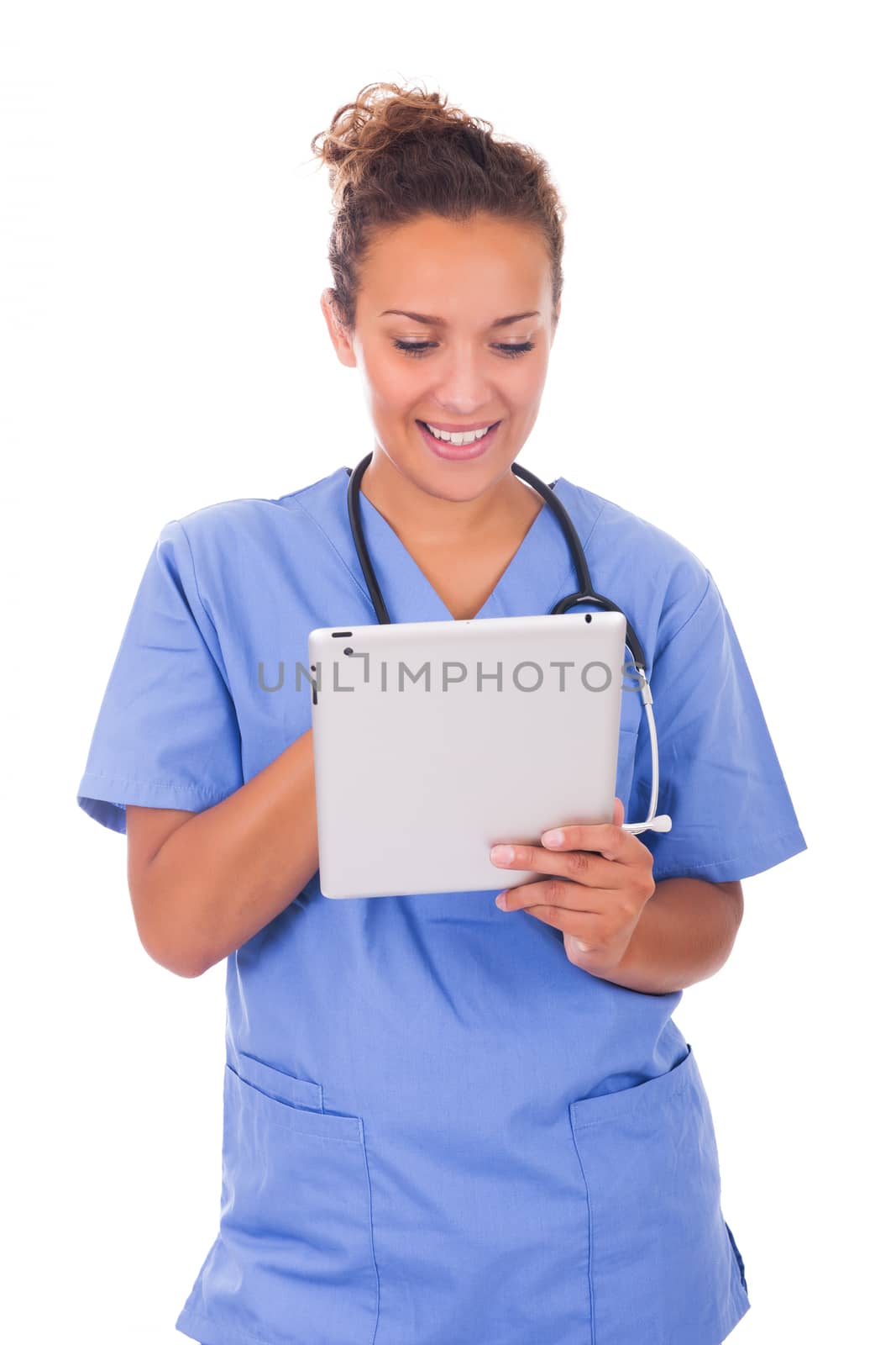 Young doctor with stethoscope and tablet isolated on white backg by michel74100