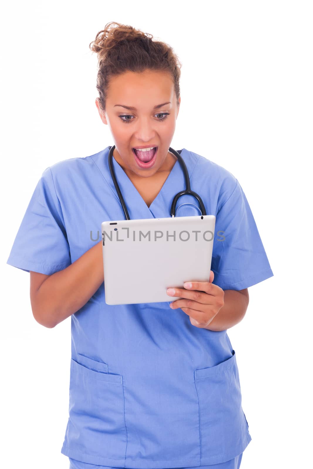 Young doctor with stethoscope and tablet isolated on white backg by michel74100