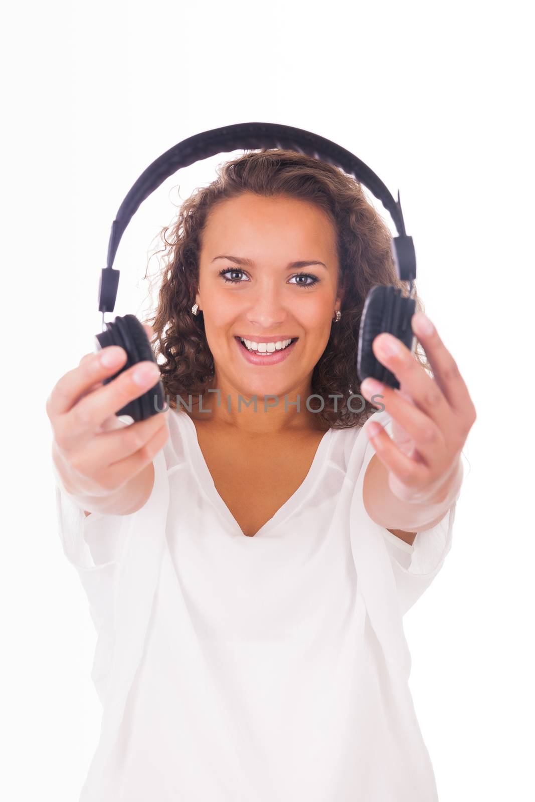 Woman listening to music with headphones by michel74100