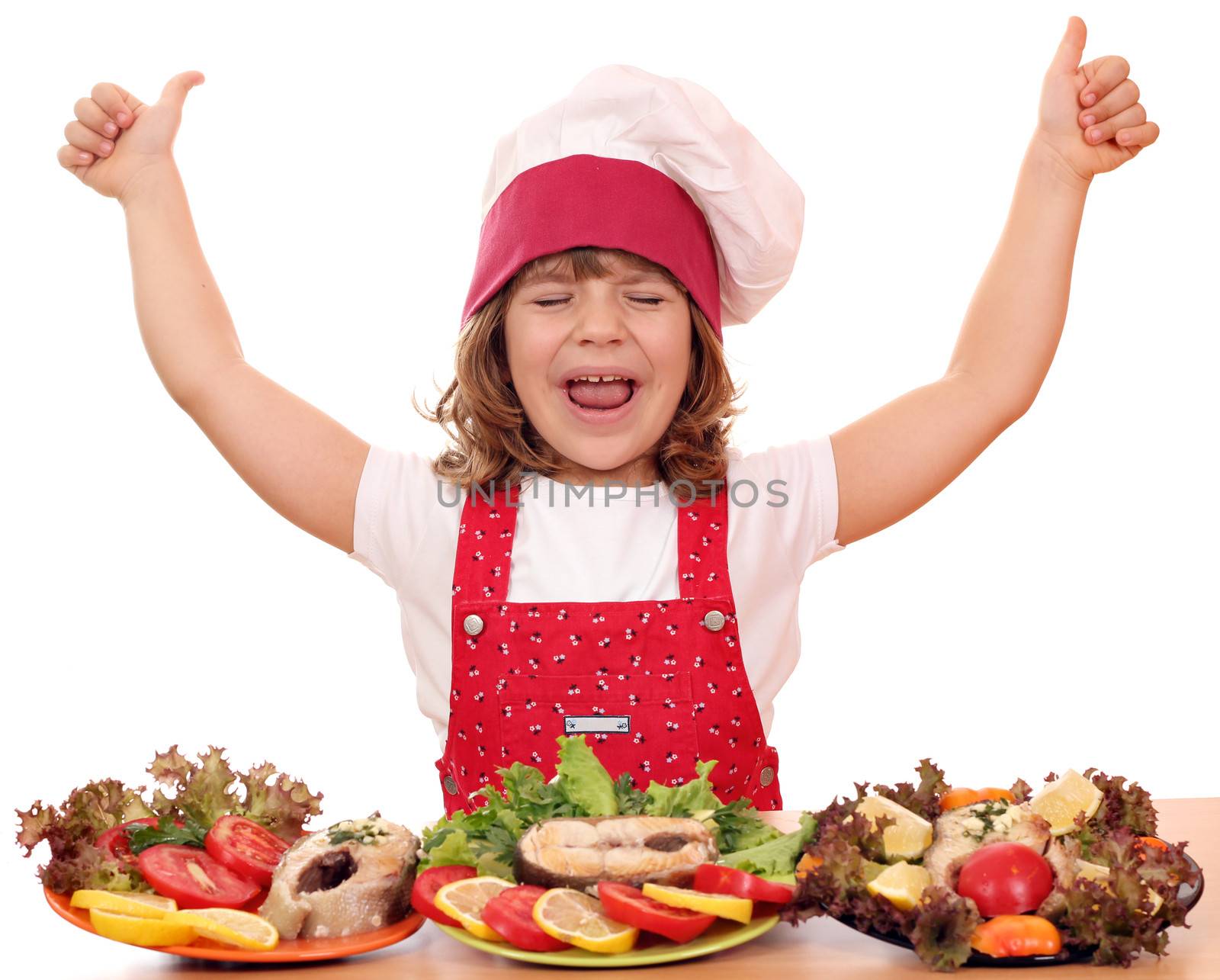 happy little girl cook with thumbs up and seafood by goce