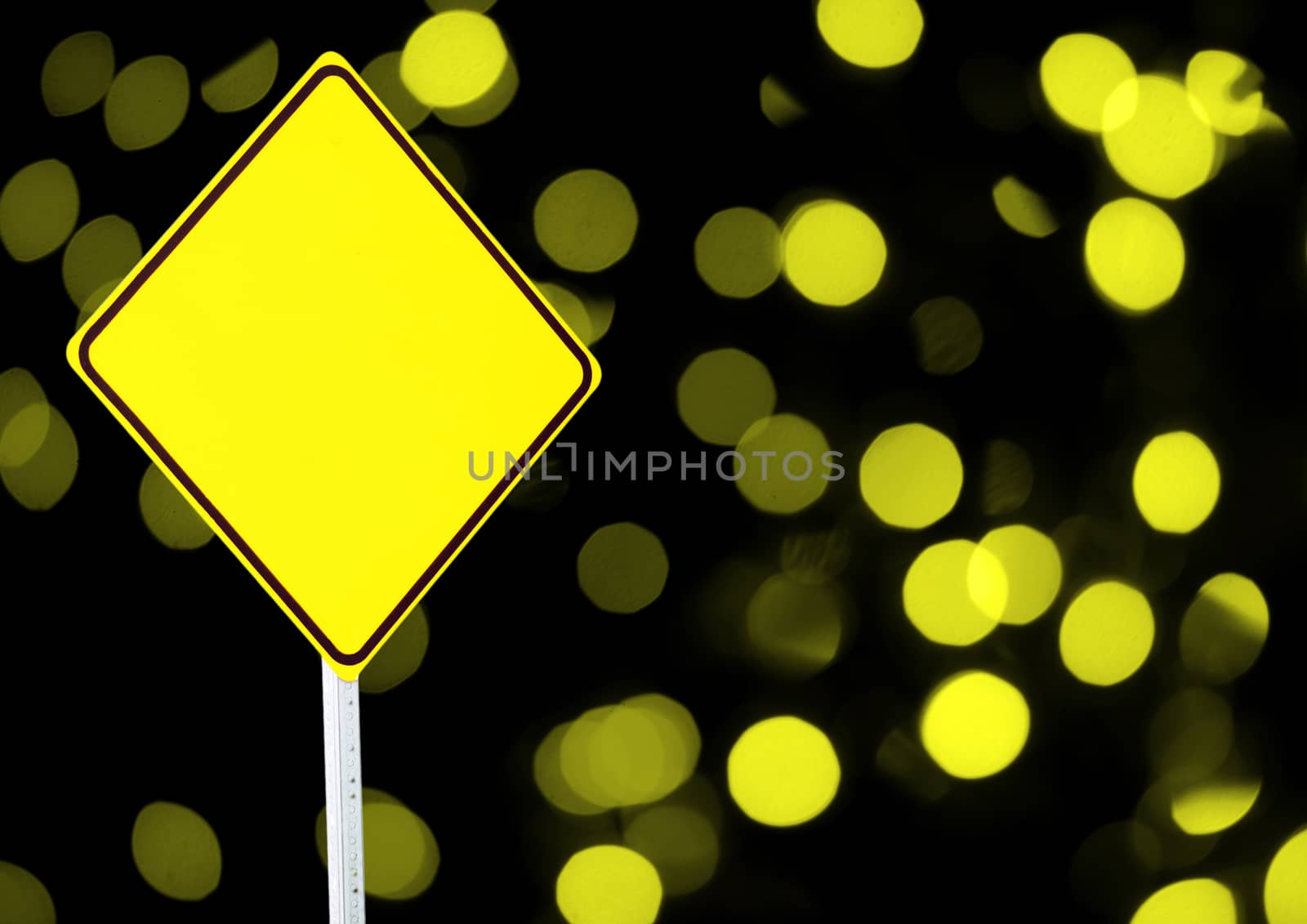 empty warning sign with abstract yellow lights background