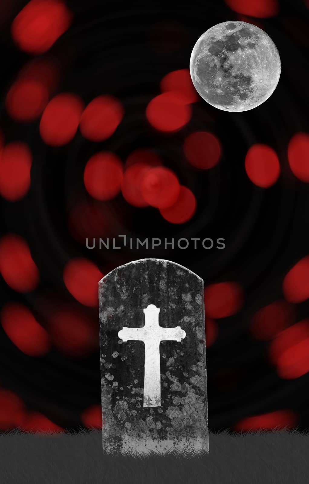 headstone in graveyard with full moon for halloween