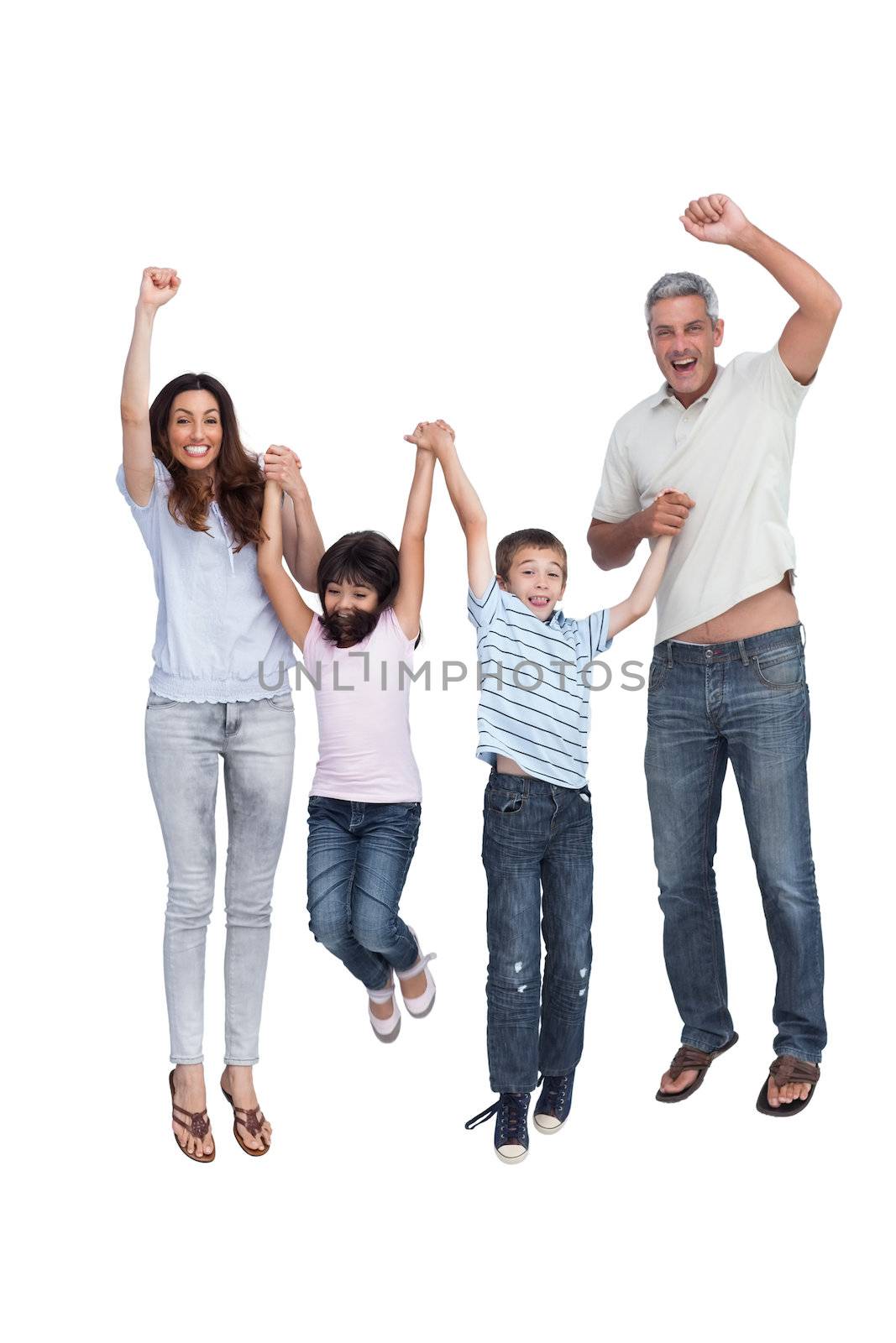 Cheerful family jumping by Wavebreakmedia
