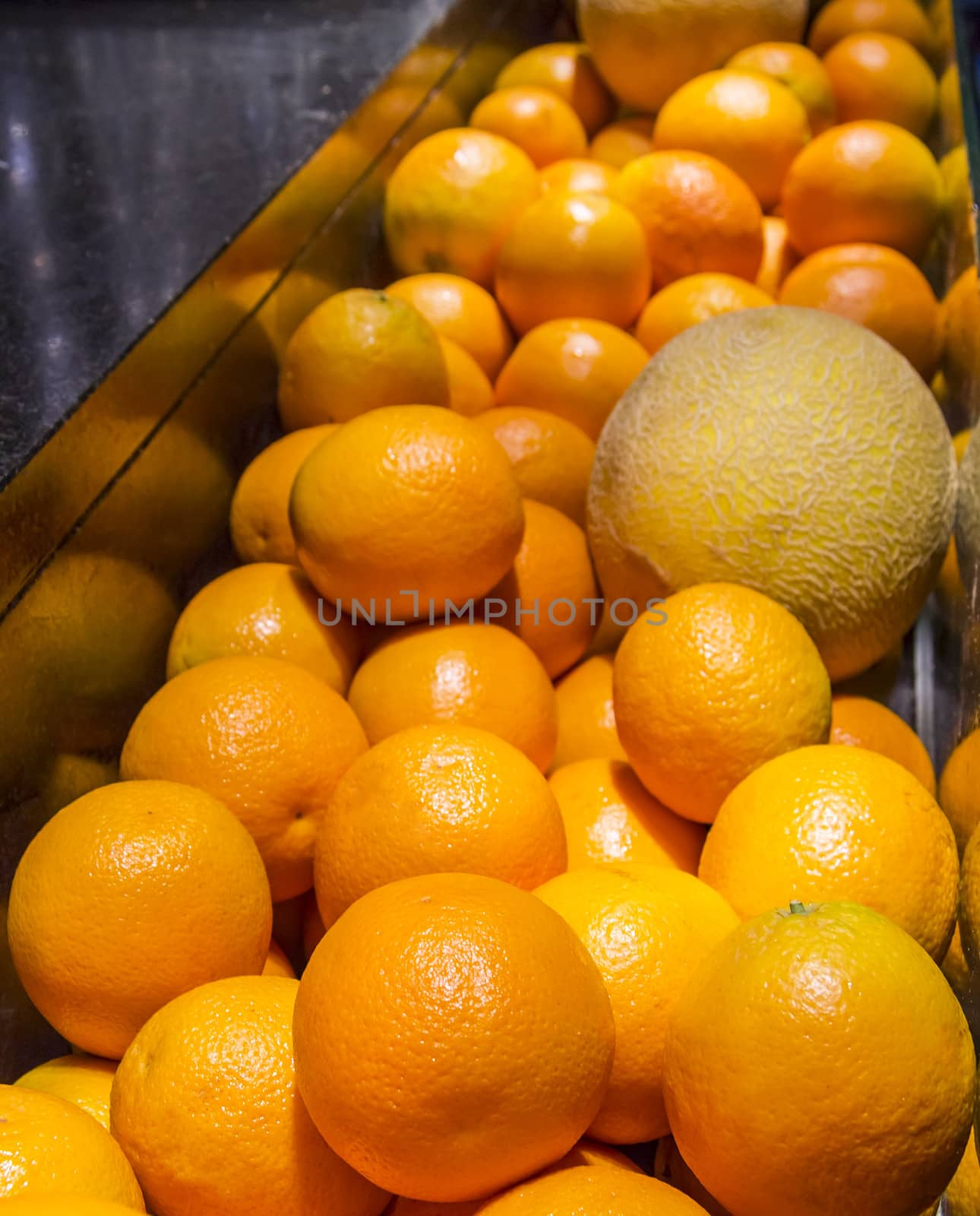 fresh oranges and melone by Tetyana