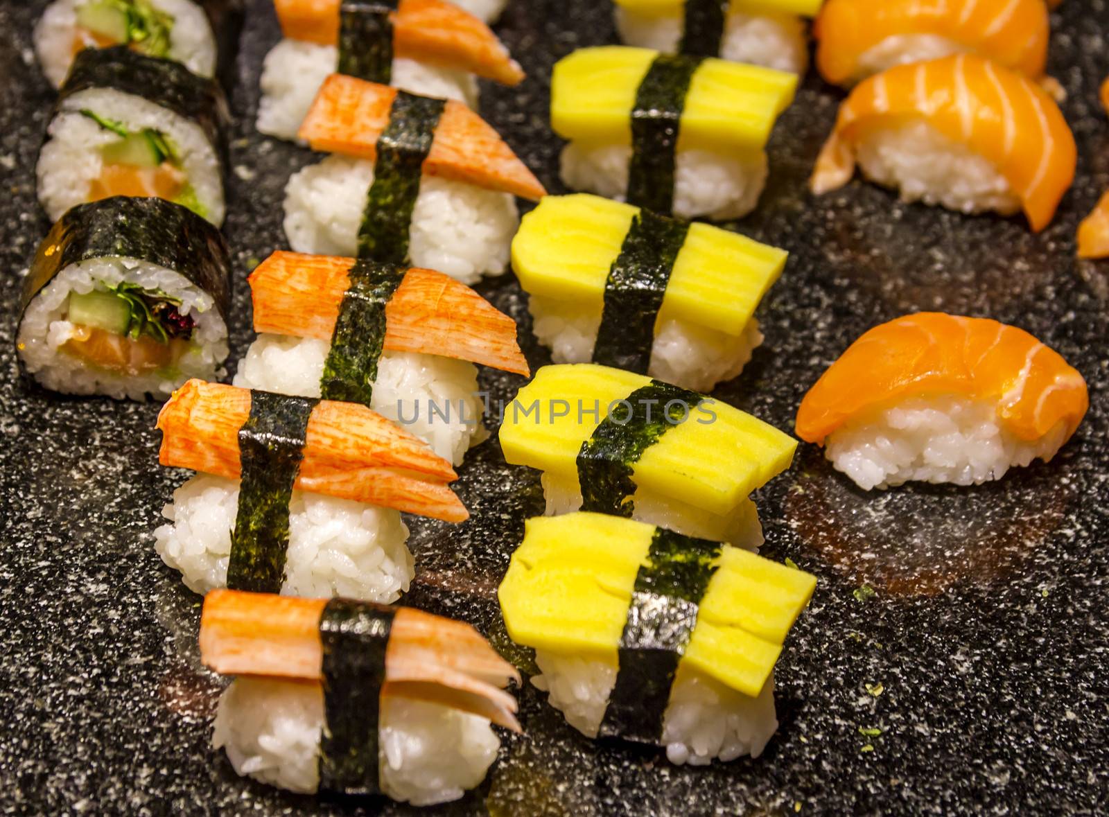 Sushi and Rolls closeup by Tetyana