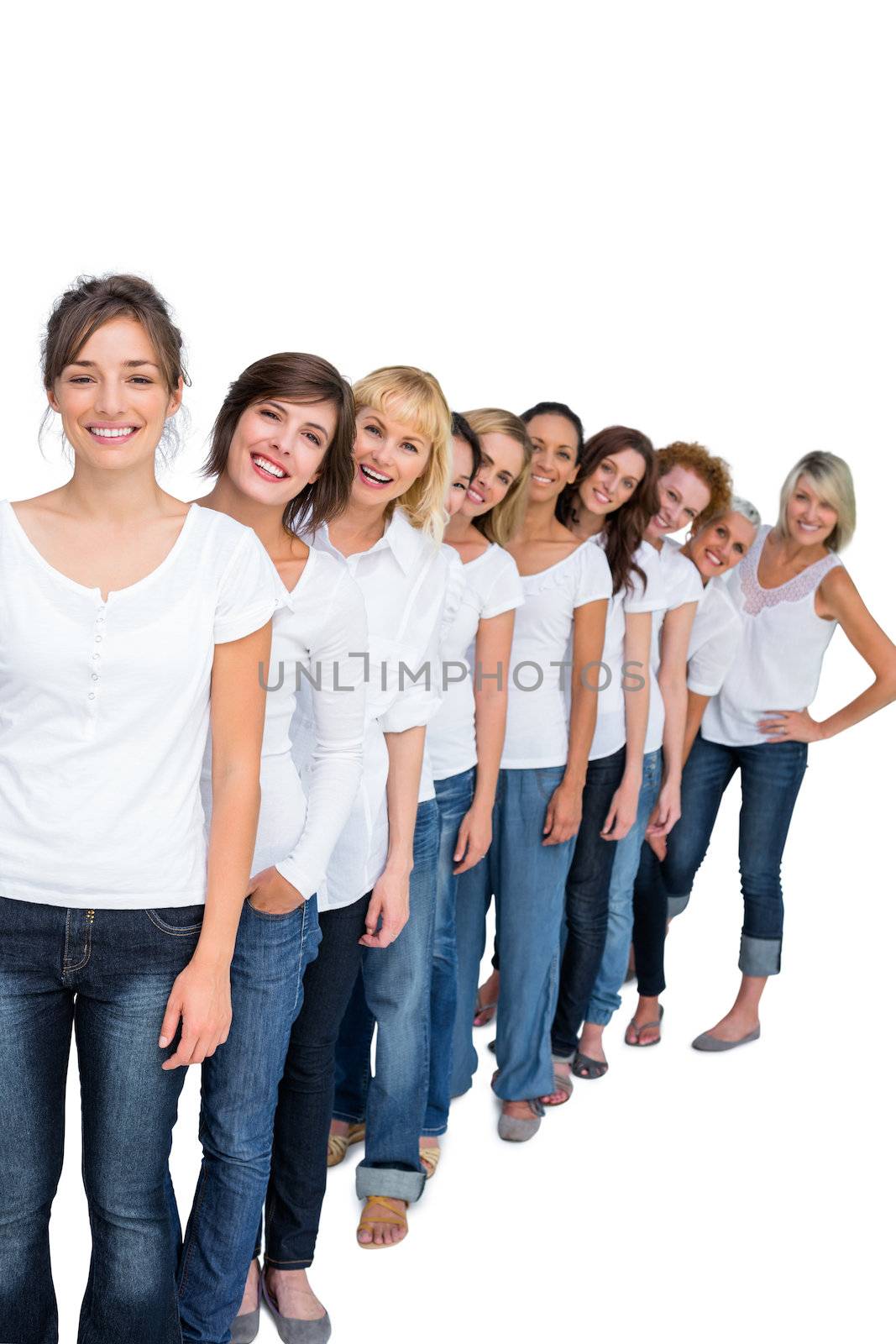 Casual models in a line looking at camera on white background