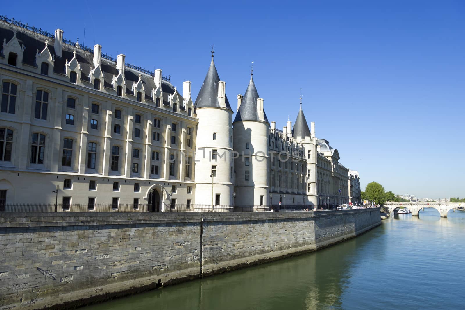 Castle Conciergerie  and bridge over Seine, Paris, France
