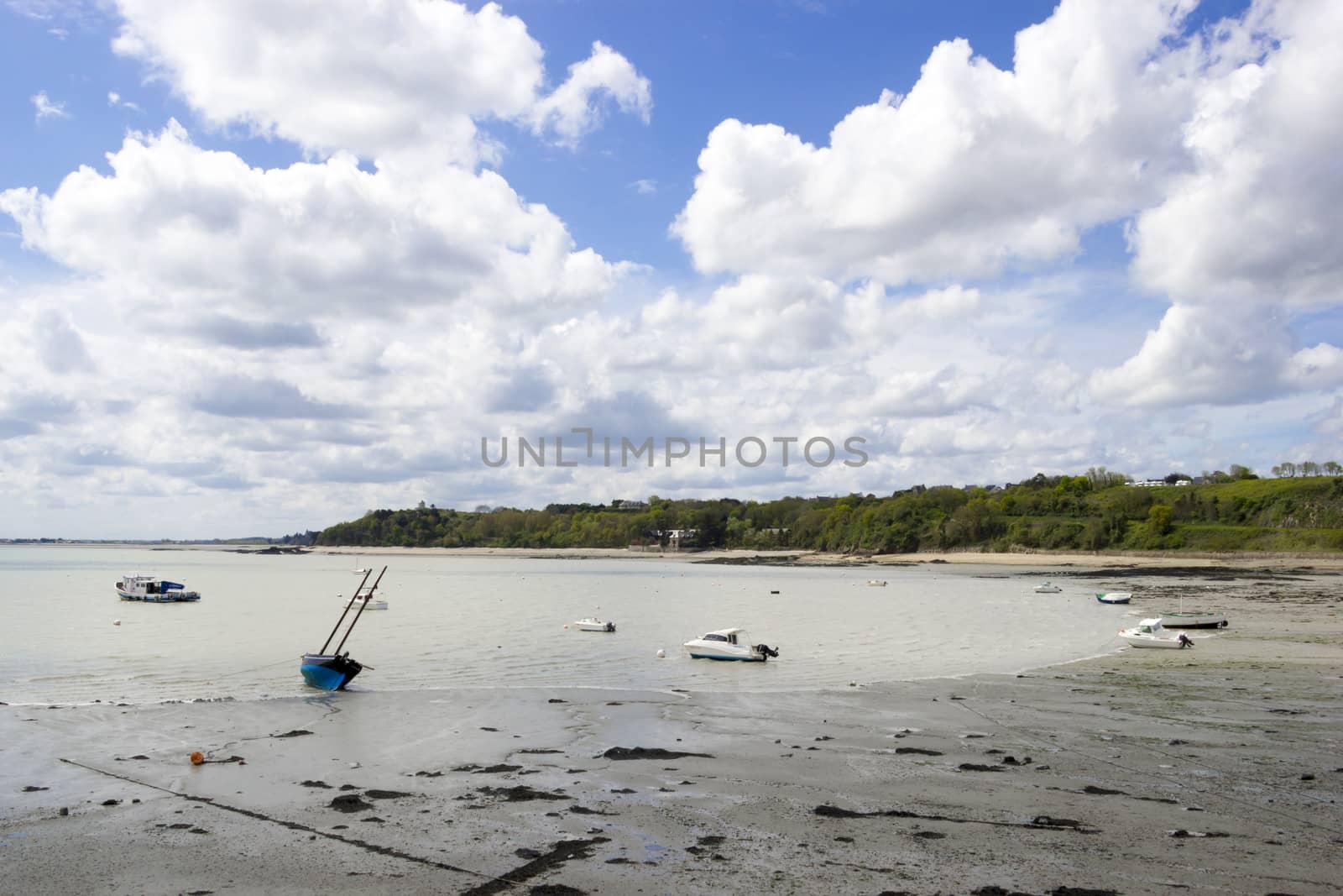 Nicel boats on the calm blue sea at low tide time, northern Fran by Tetyana