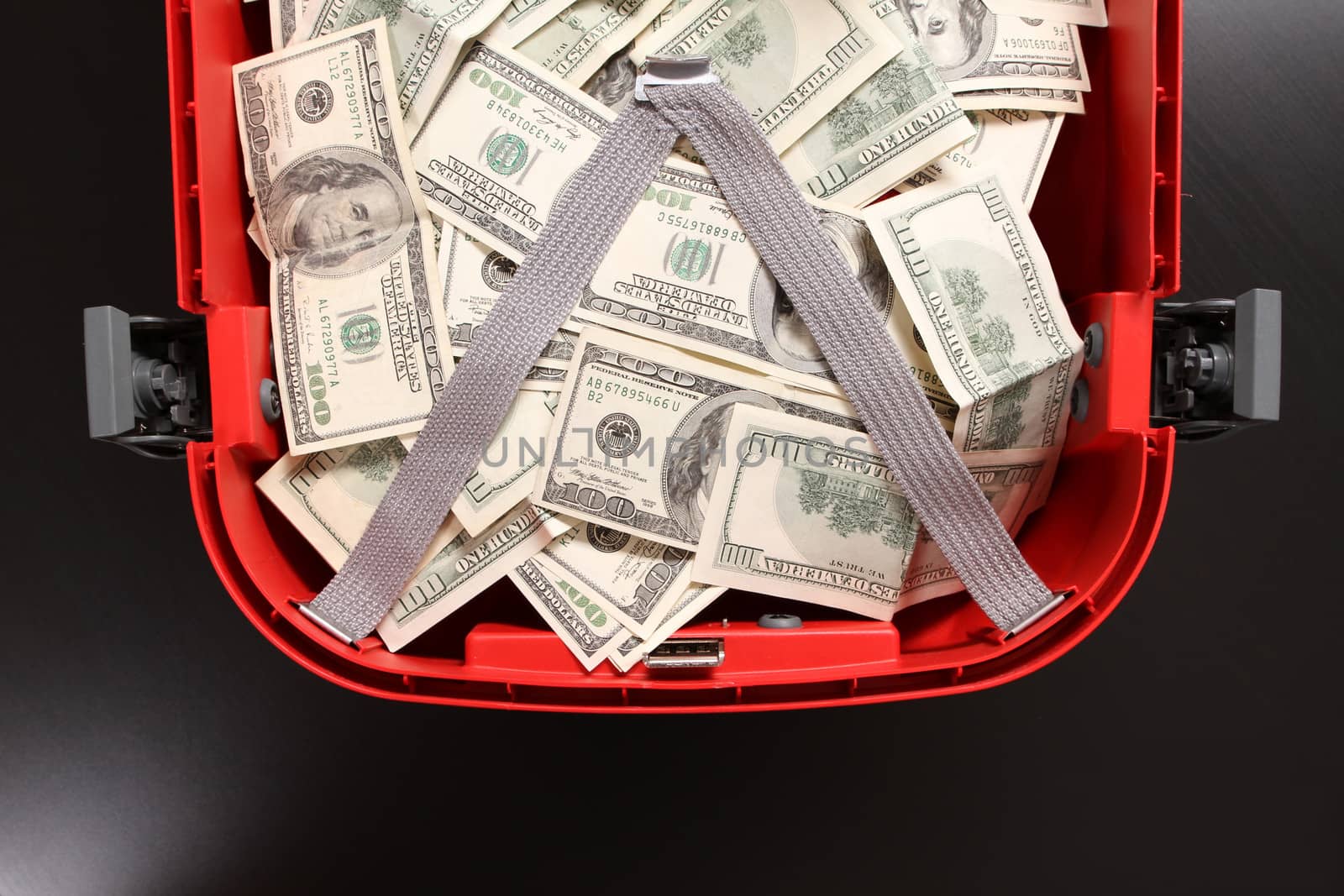 A Suitcase with lots of dollars
