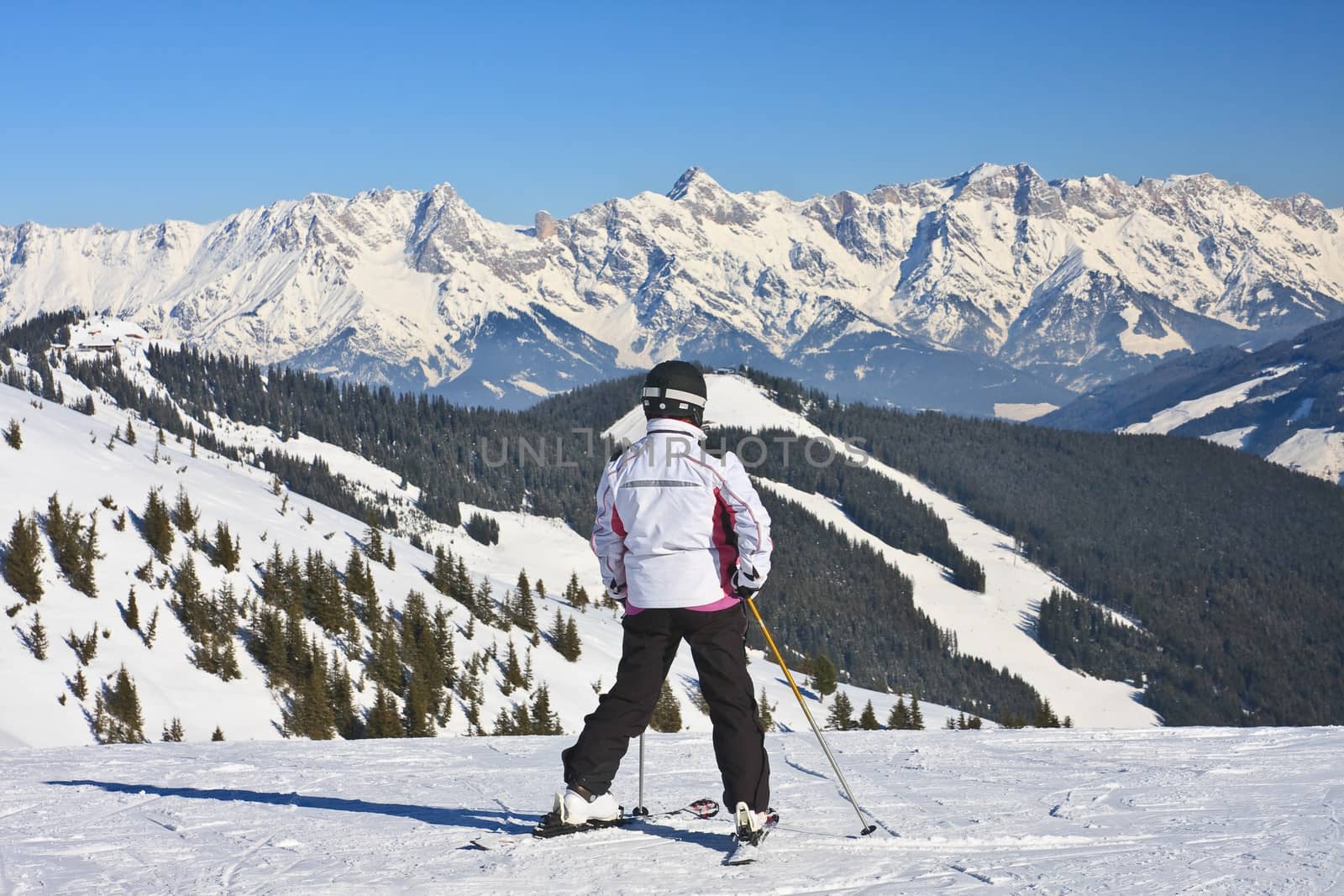 Skier on the slope ski resort  Zell am See, Austrian  by nikolpetr