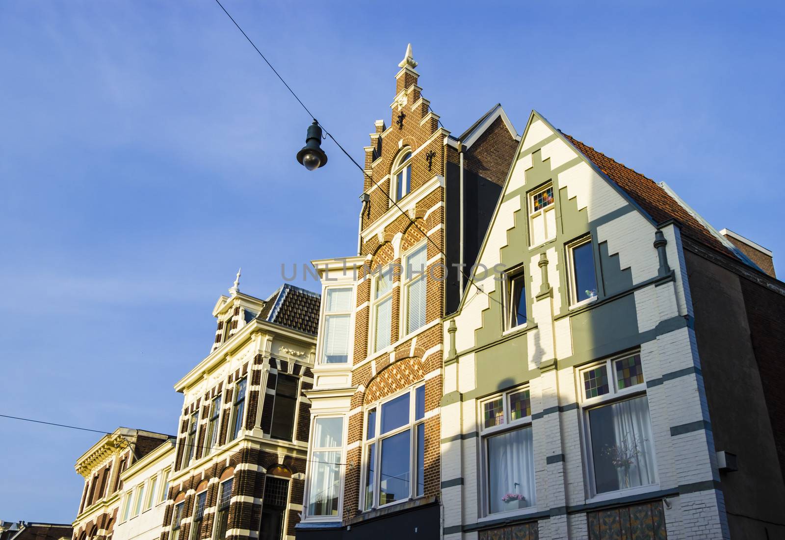 Old typical Dutch house into the sunset, Haarlem, the Netherlands