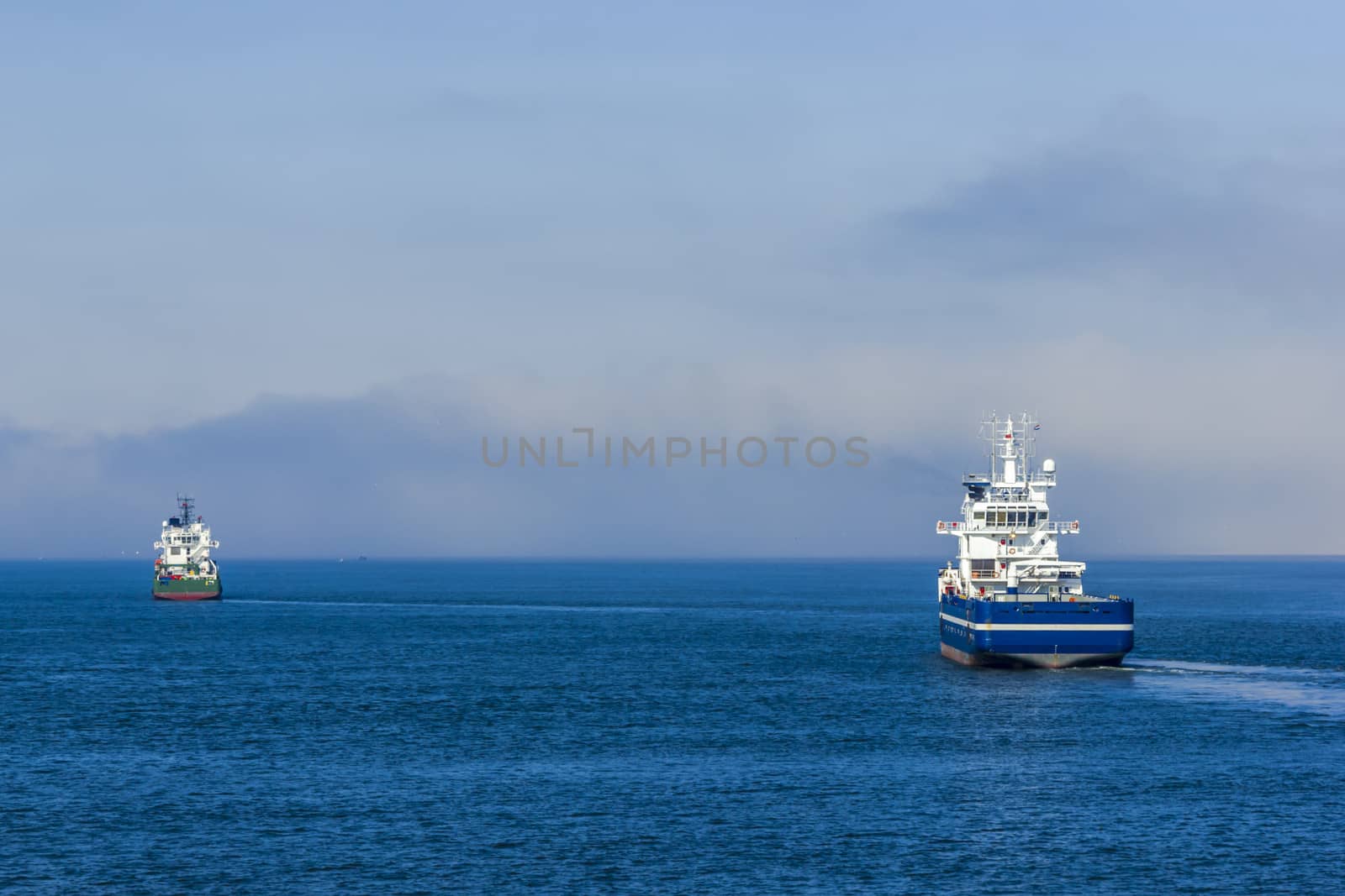 Two cargo ships in the Northern sea