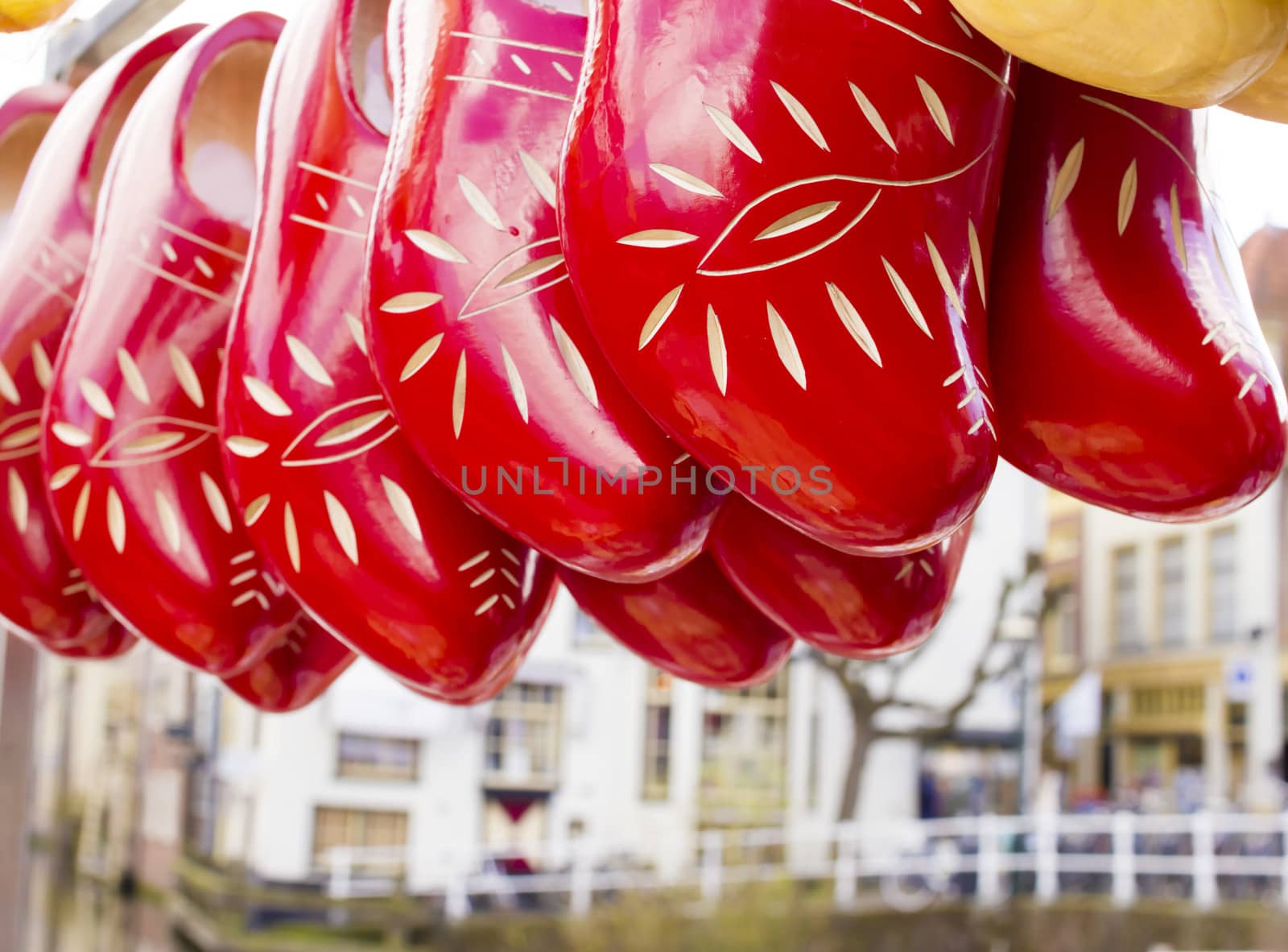 Dutch traditional wooden shoes with ornament, clogs, symbol of the Netherlands.