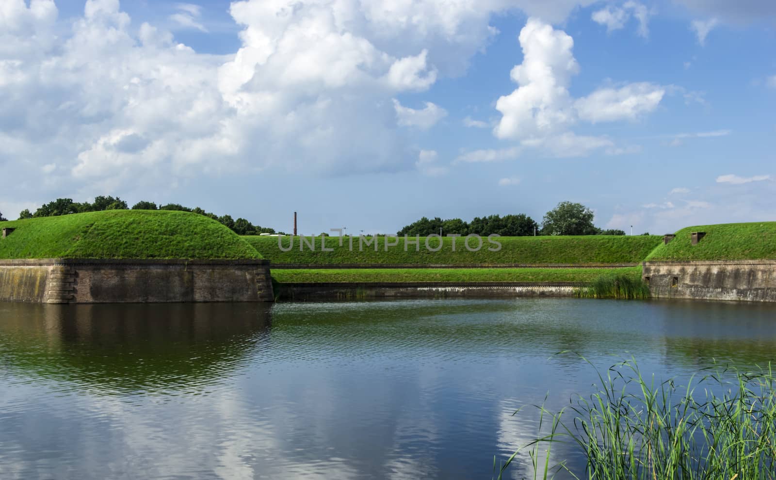 Summer landscape at the medieval fort of Naarden in the Netherla by Tetyana