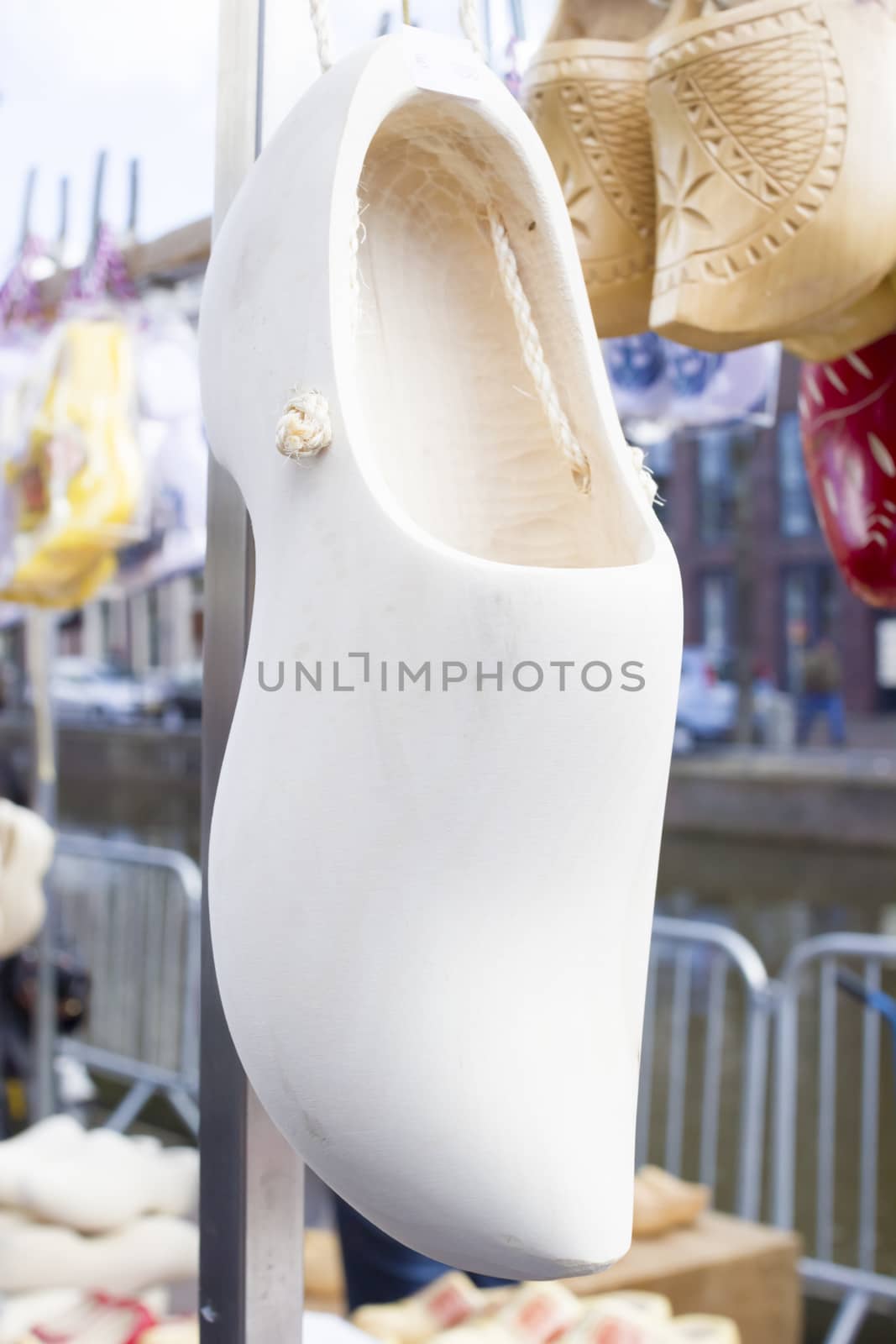 Dutch traditional wooden shoes with ornament, clogs, symbol of the Netherlands.