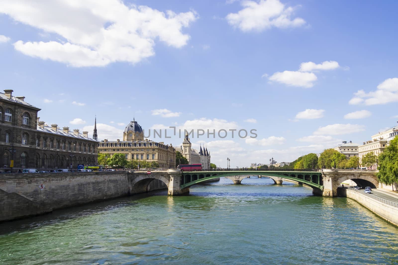 View of Palais de Justice and a bridge over the Seine river. Par by Tetyana