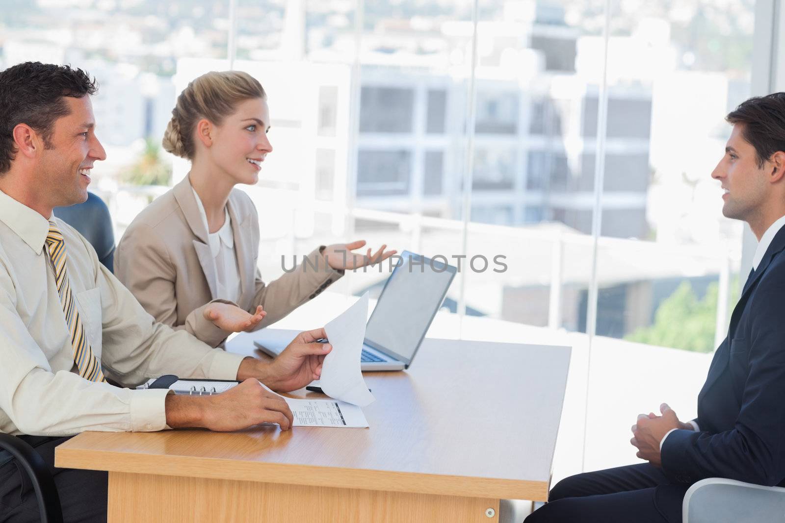 Business people having an interview in their office