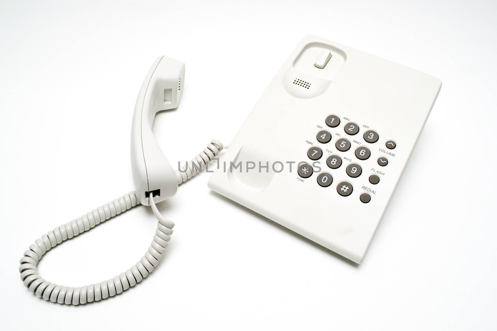 Office telephone on white background