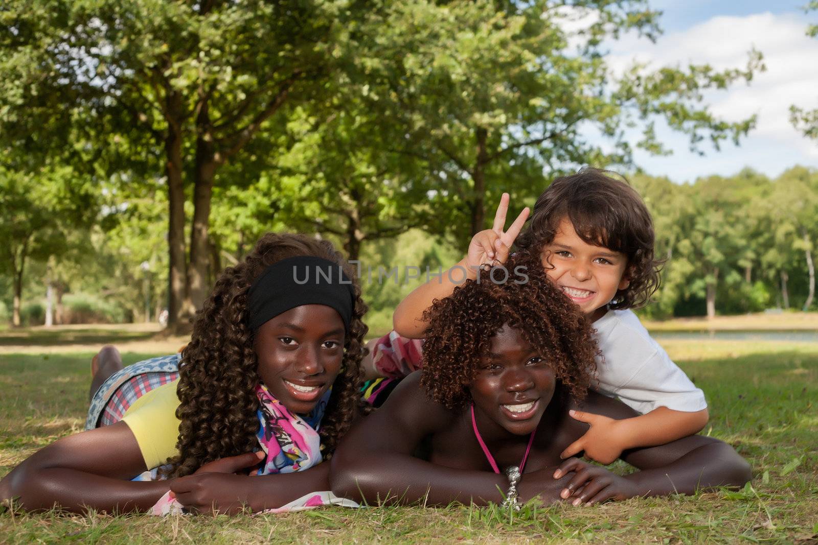 Multi ethnic children and peace sign by DNFStyle