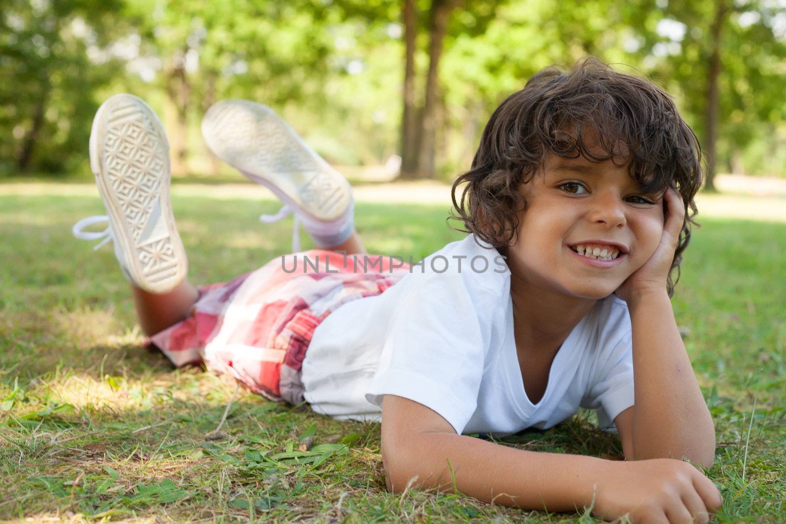 Happy caucasian boy having a nice day in the summer