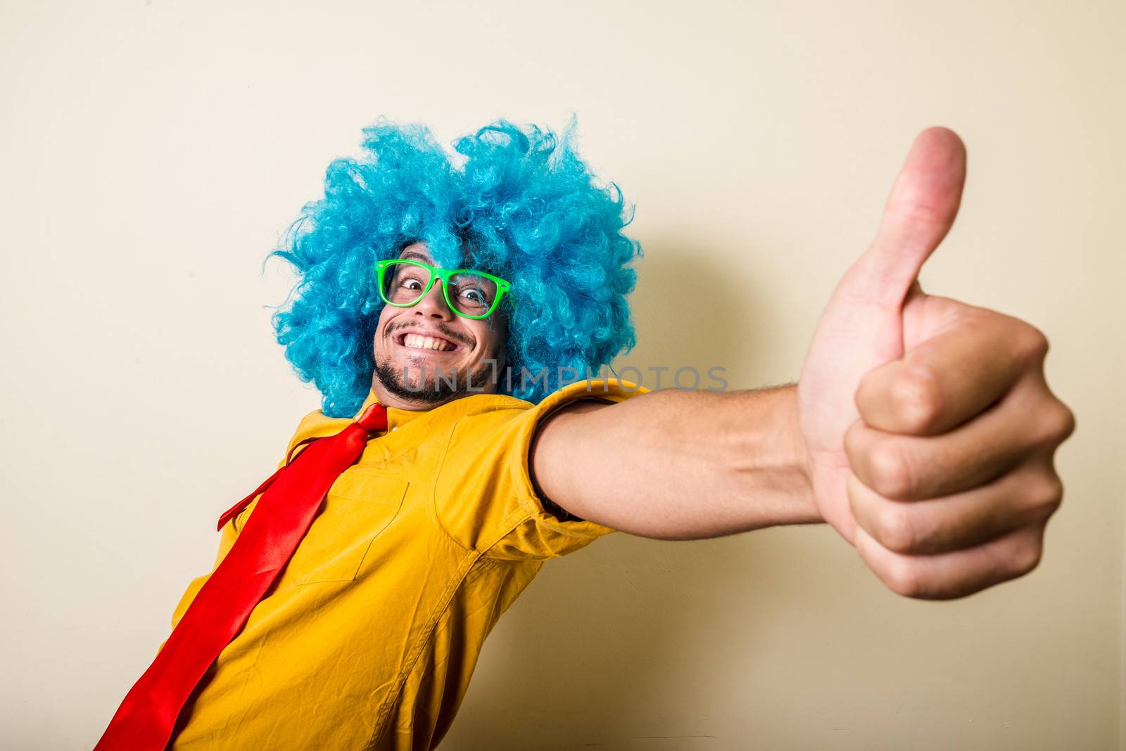 crazy funny young man with blue wig by peus